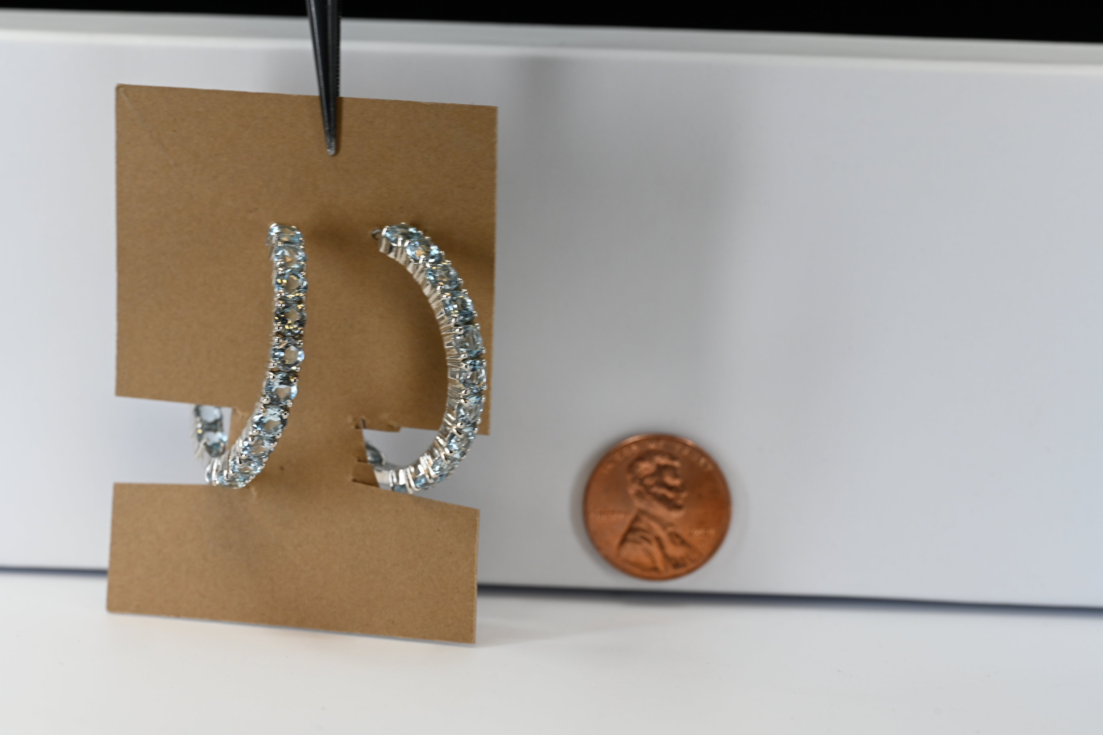 Sterling Silver  Round Light Blue Stones Hoop Earring