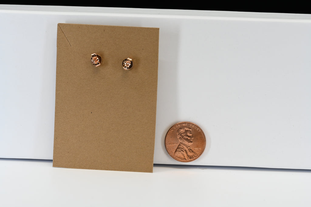 Sterling Silver Rose-tone Flower Purple Heart Stone Stud Earrings