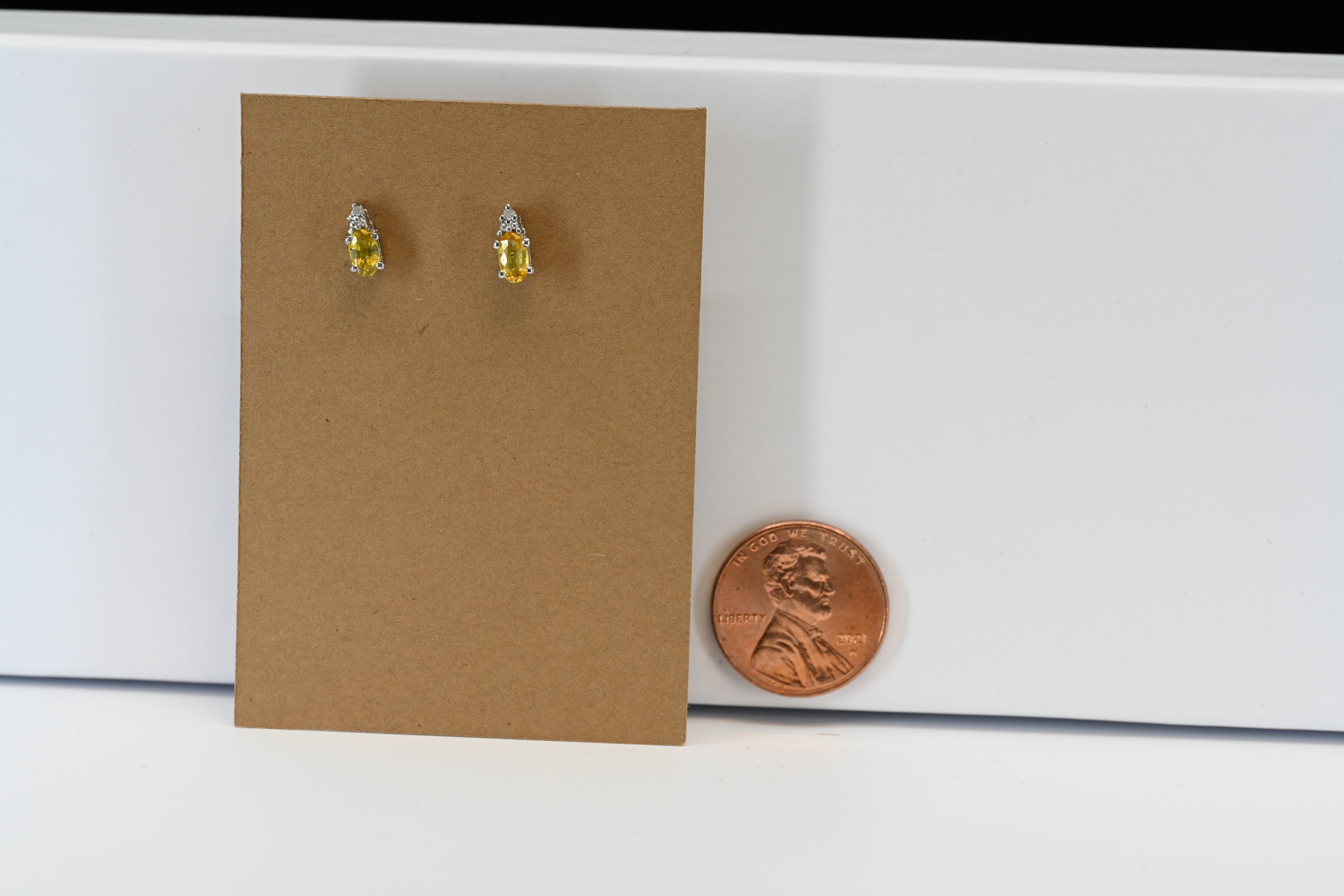 Sterling Silver Oval Yellow Stones With Round Colorless Stone Stud Earrings