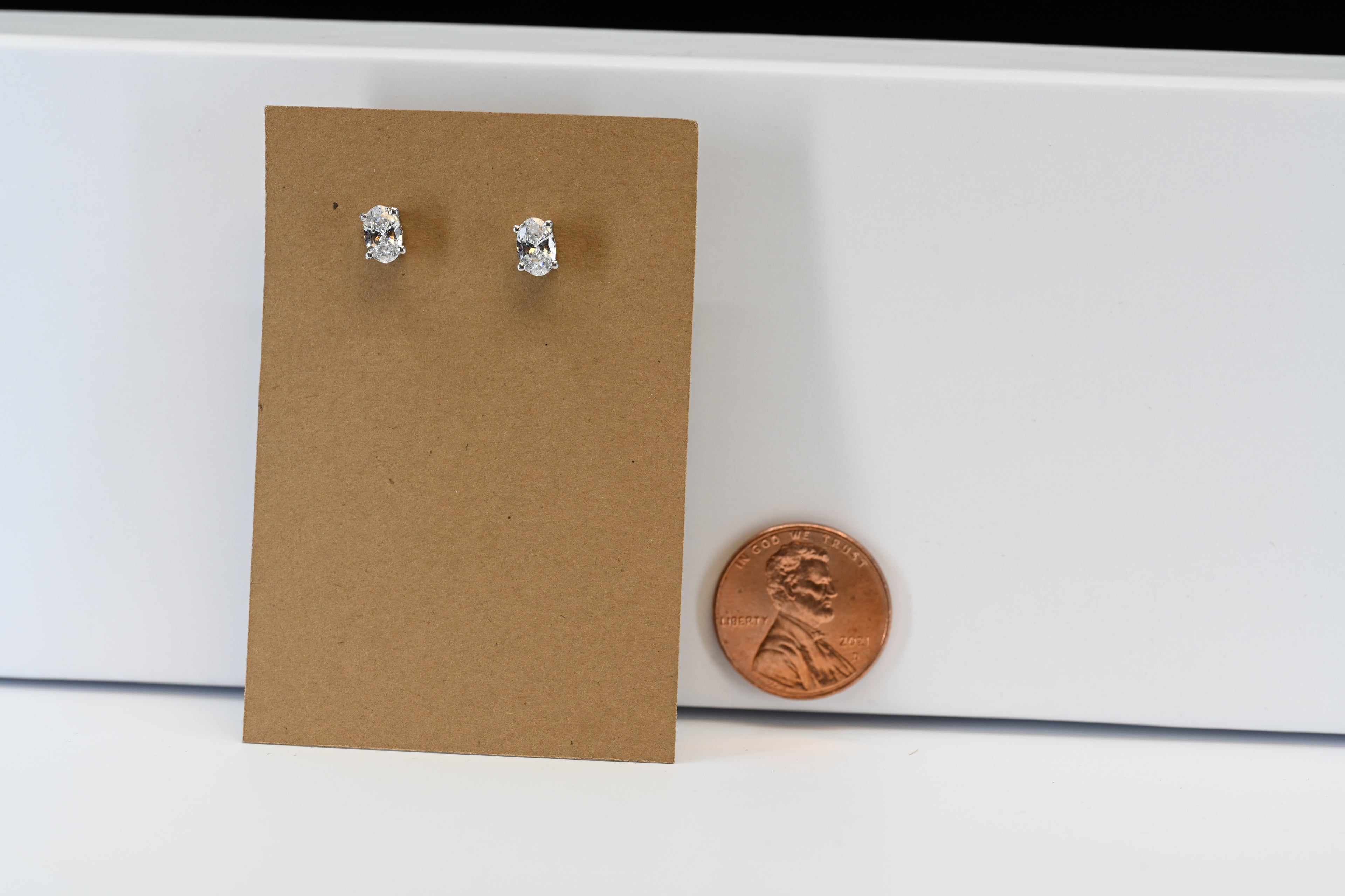 Sterling Silver Oval Colorless Stone Stud Earrings
