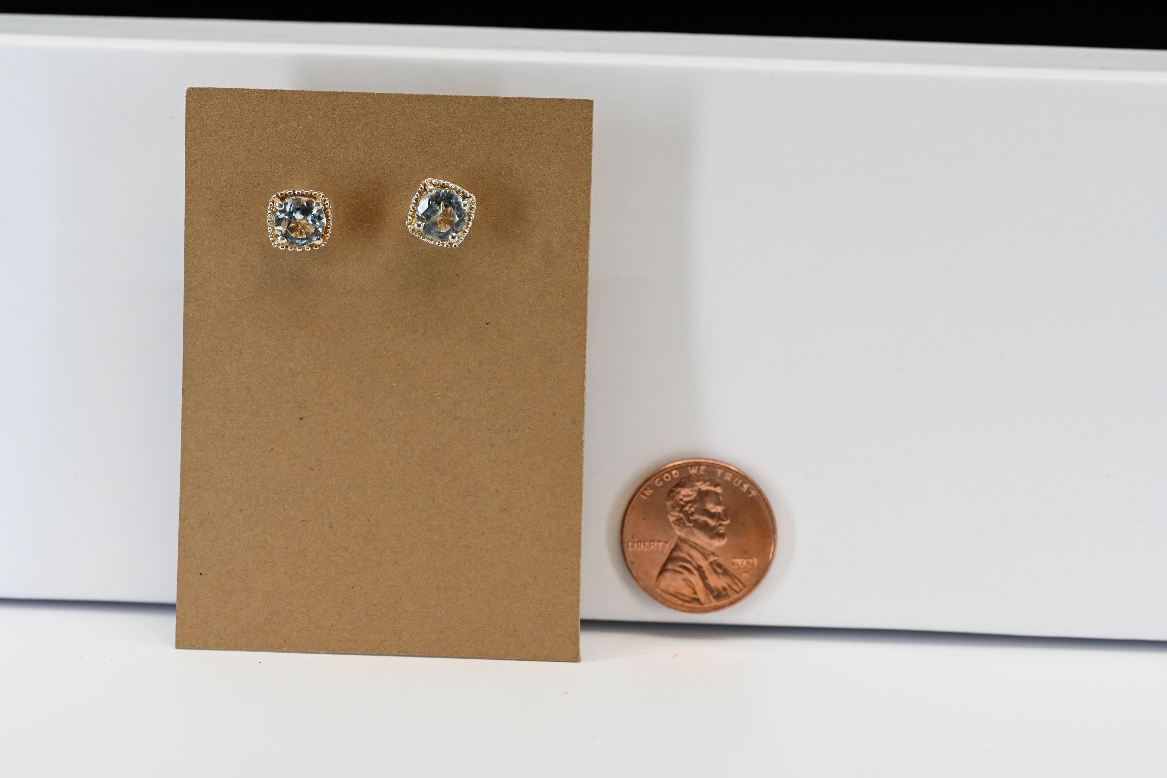 Sterling Silver Round Light Blue Stud Earrings