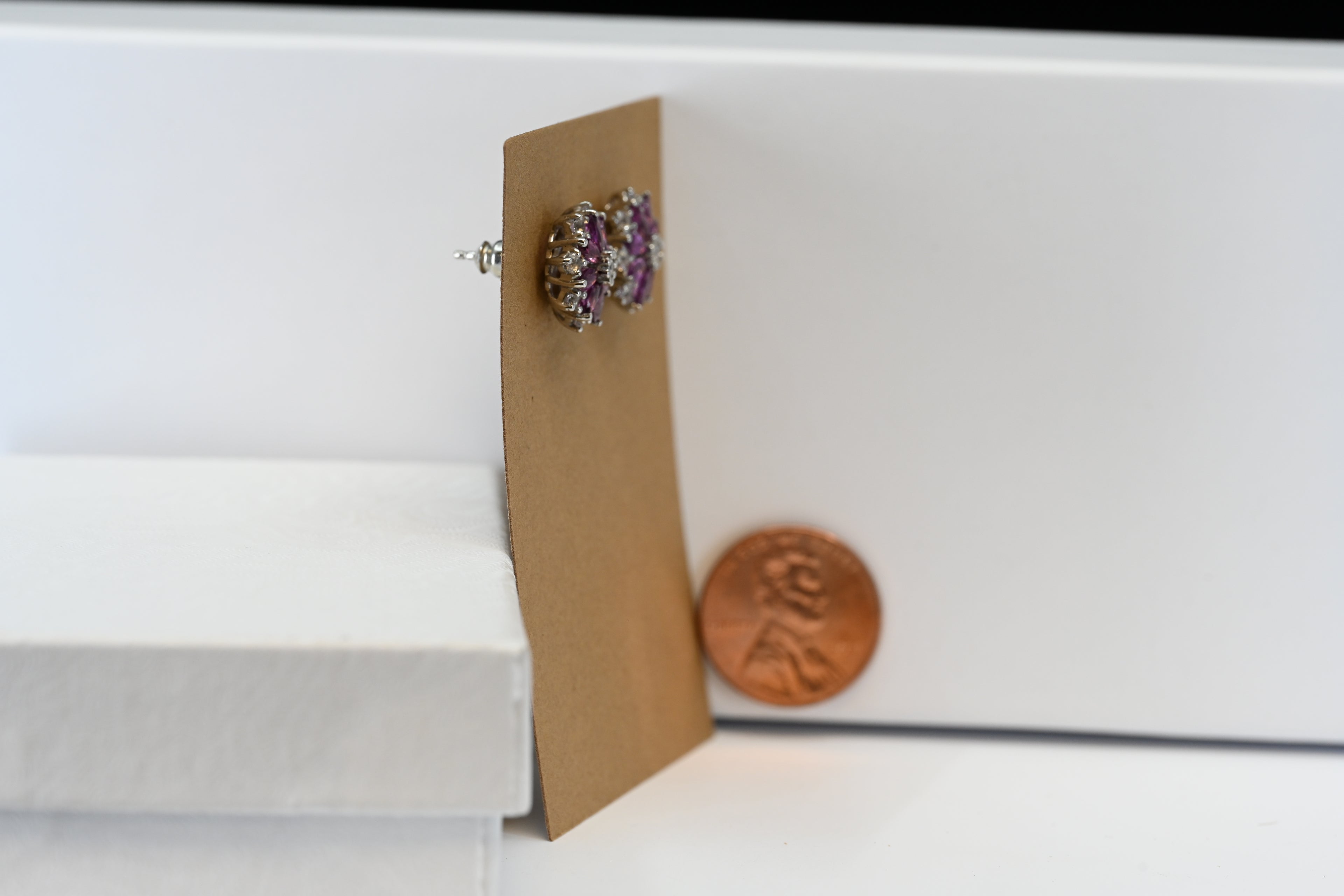 Sterling Silver Marquise Cut Purple Stones with Round Colorless Stones Stud earrings