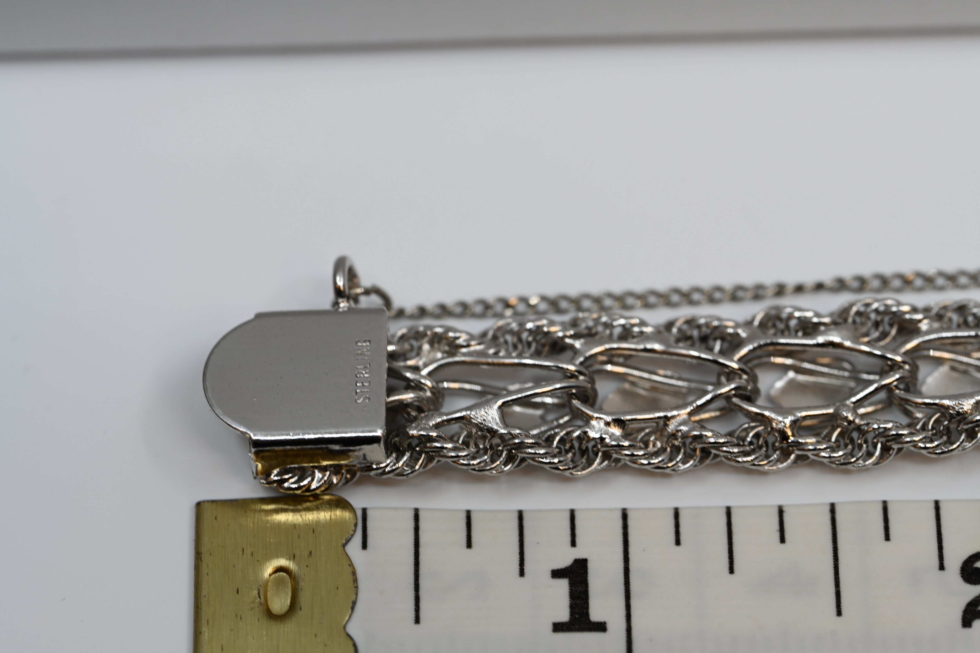 Sterling Silver Charm Bracelet with Heart Accents and Safety Chain