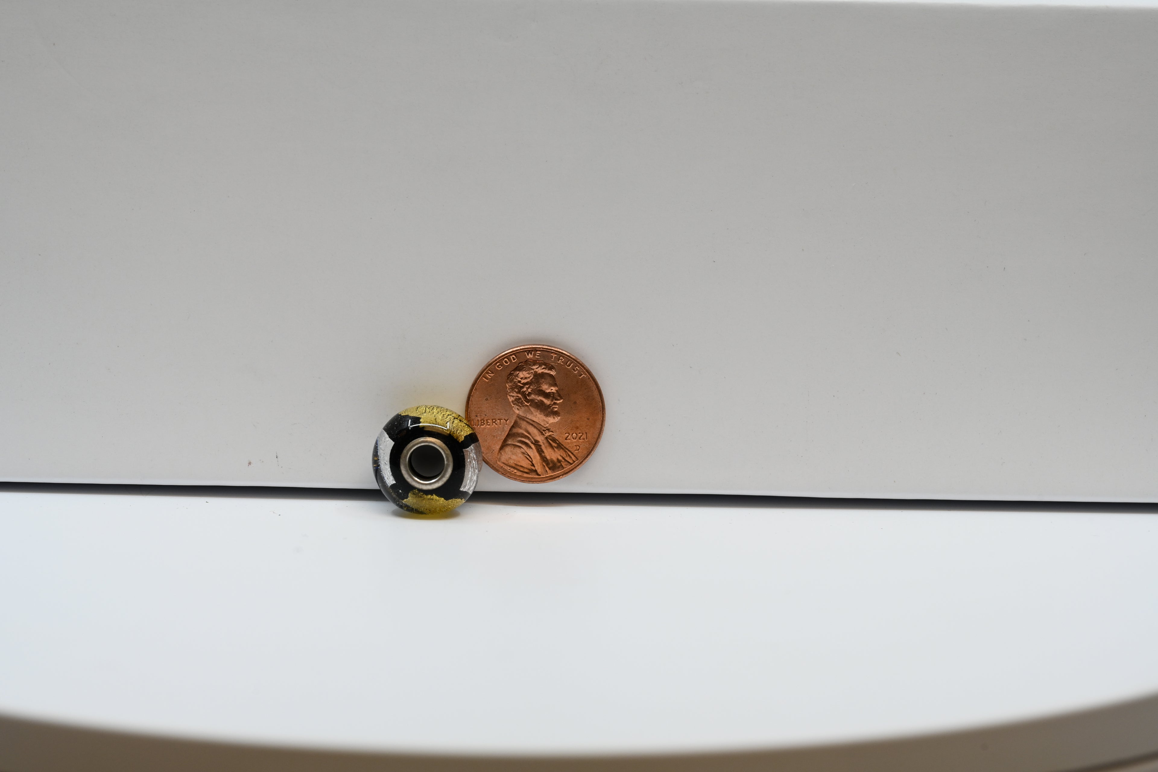 Black Bead Charm With Gold and Silver Leaf