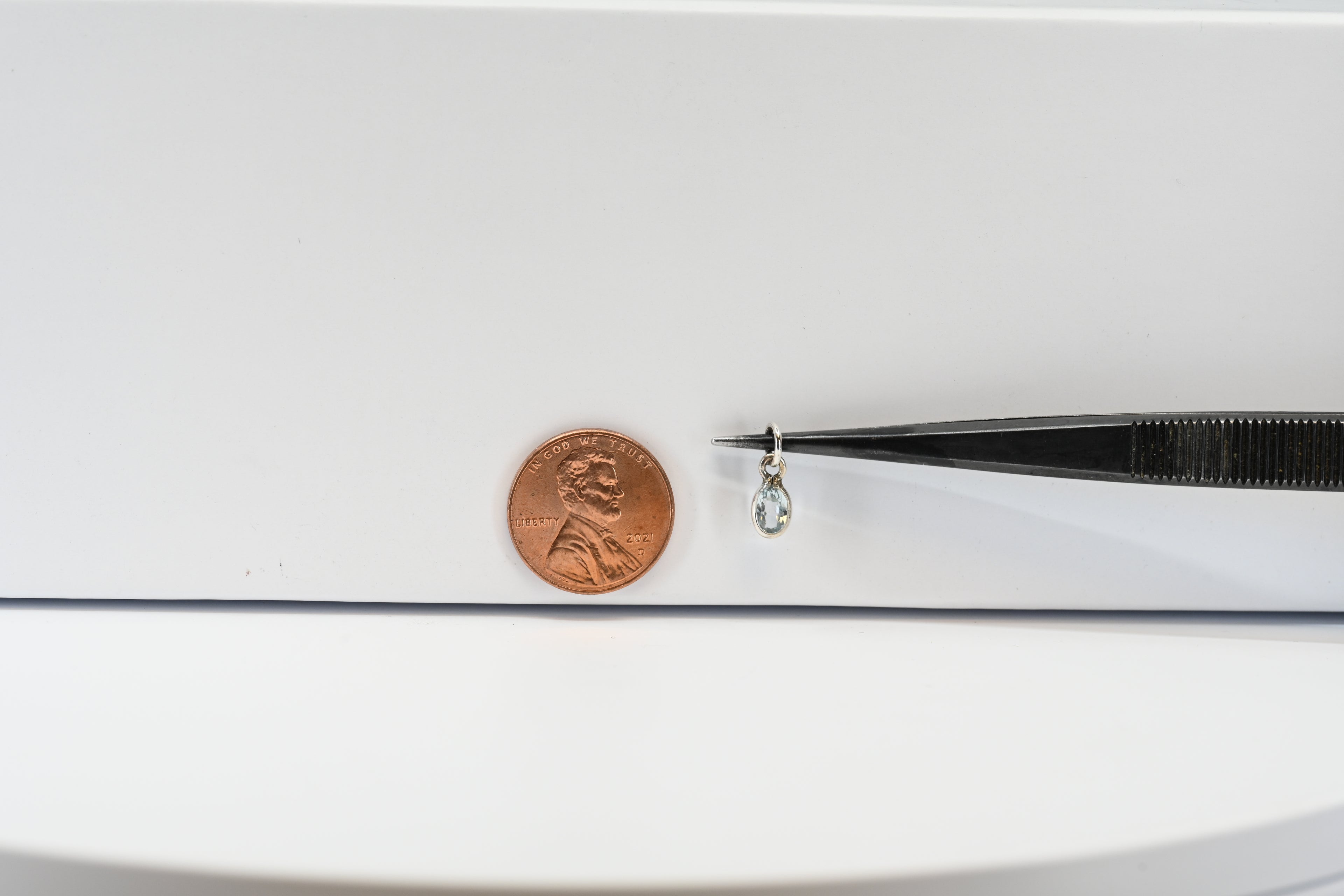 Sterling Silver Blue Oval Topaz Charm