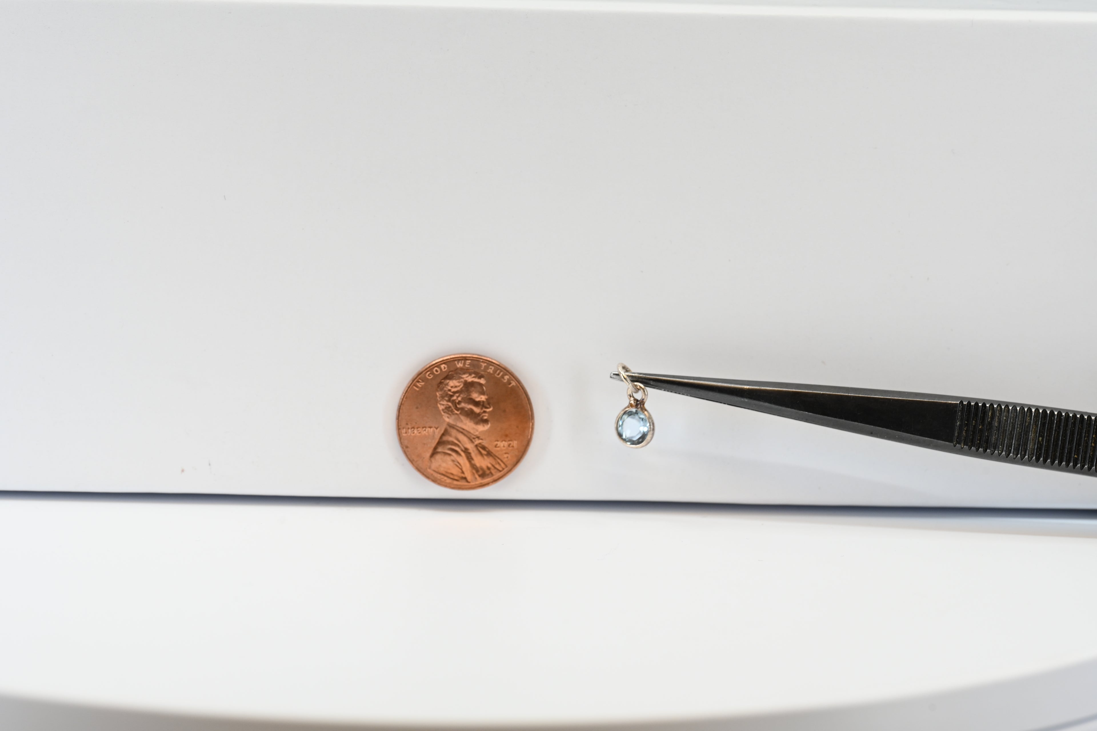 Sterling Silver Blue Round Topaz Charm