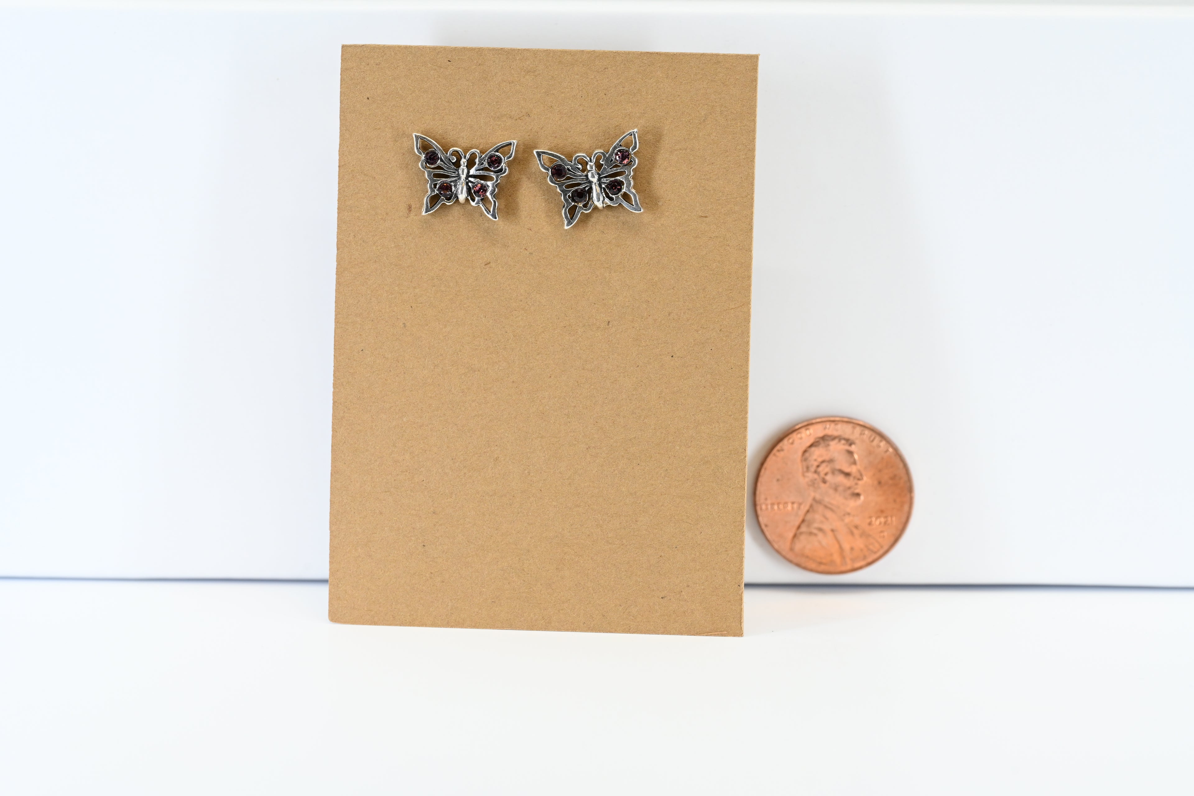 Sterling Silver Butterfly Stud Earring  With purple Gemstones
