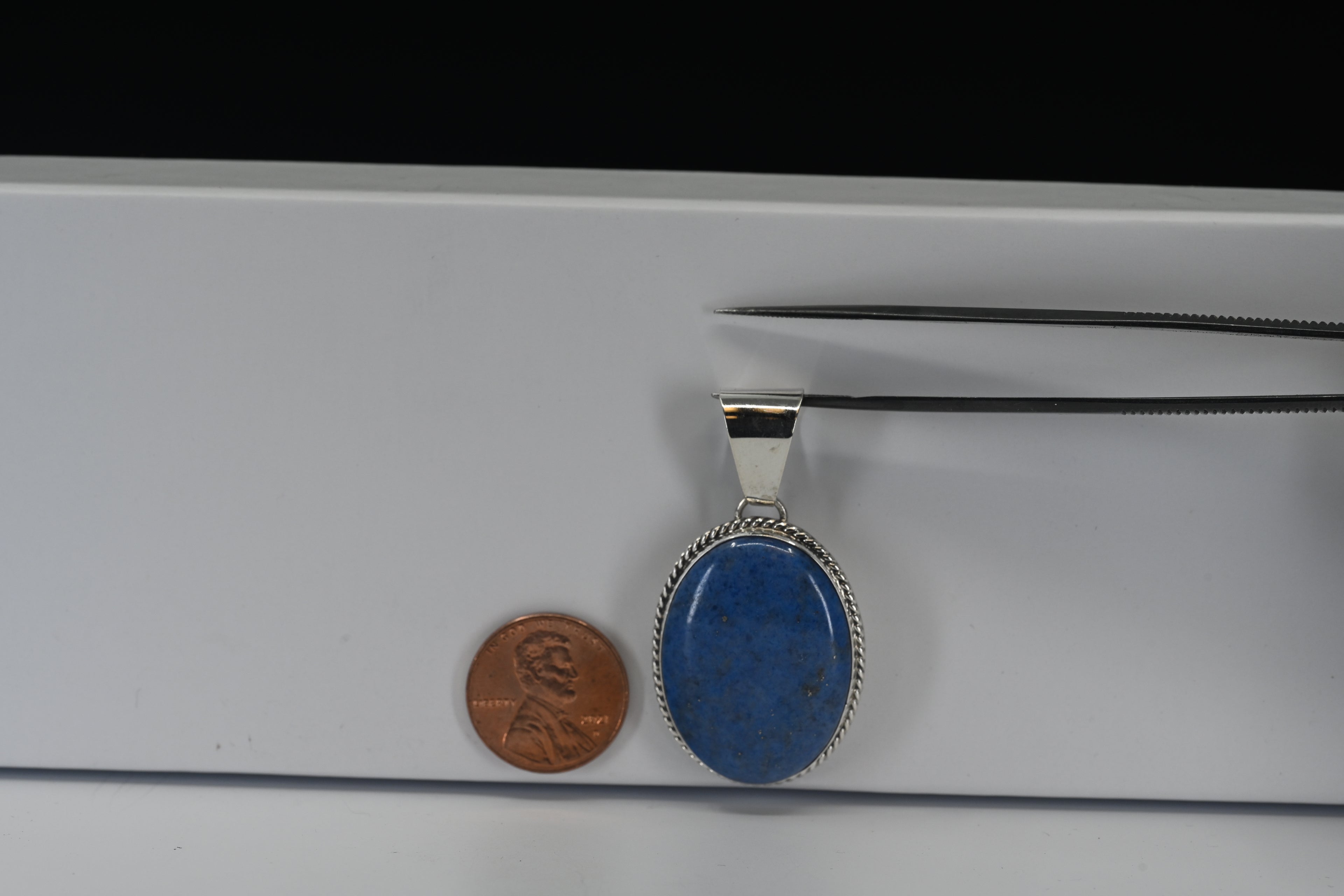 Sterling Silver Cabochon Cut Oval Blue Stone Pendant