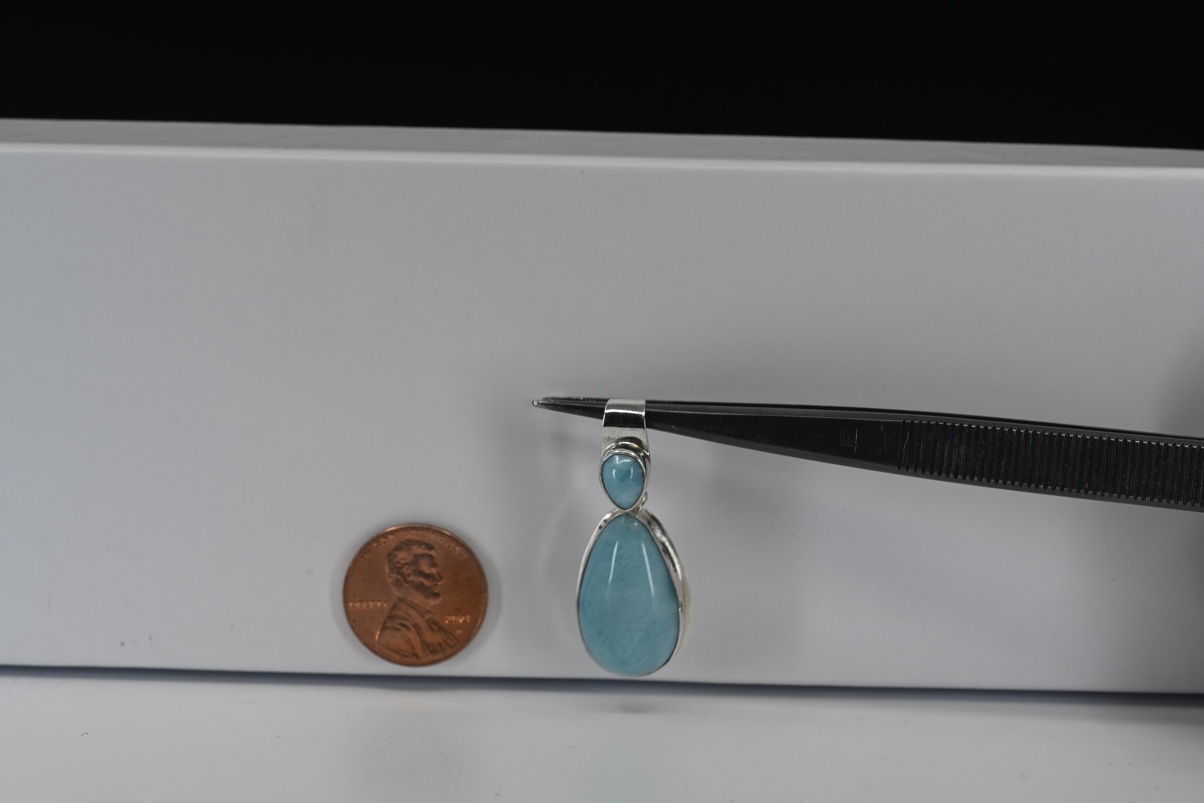 Sterling Silver Pear Shaped Teal Stone Pendant