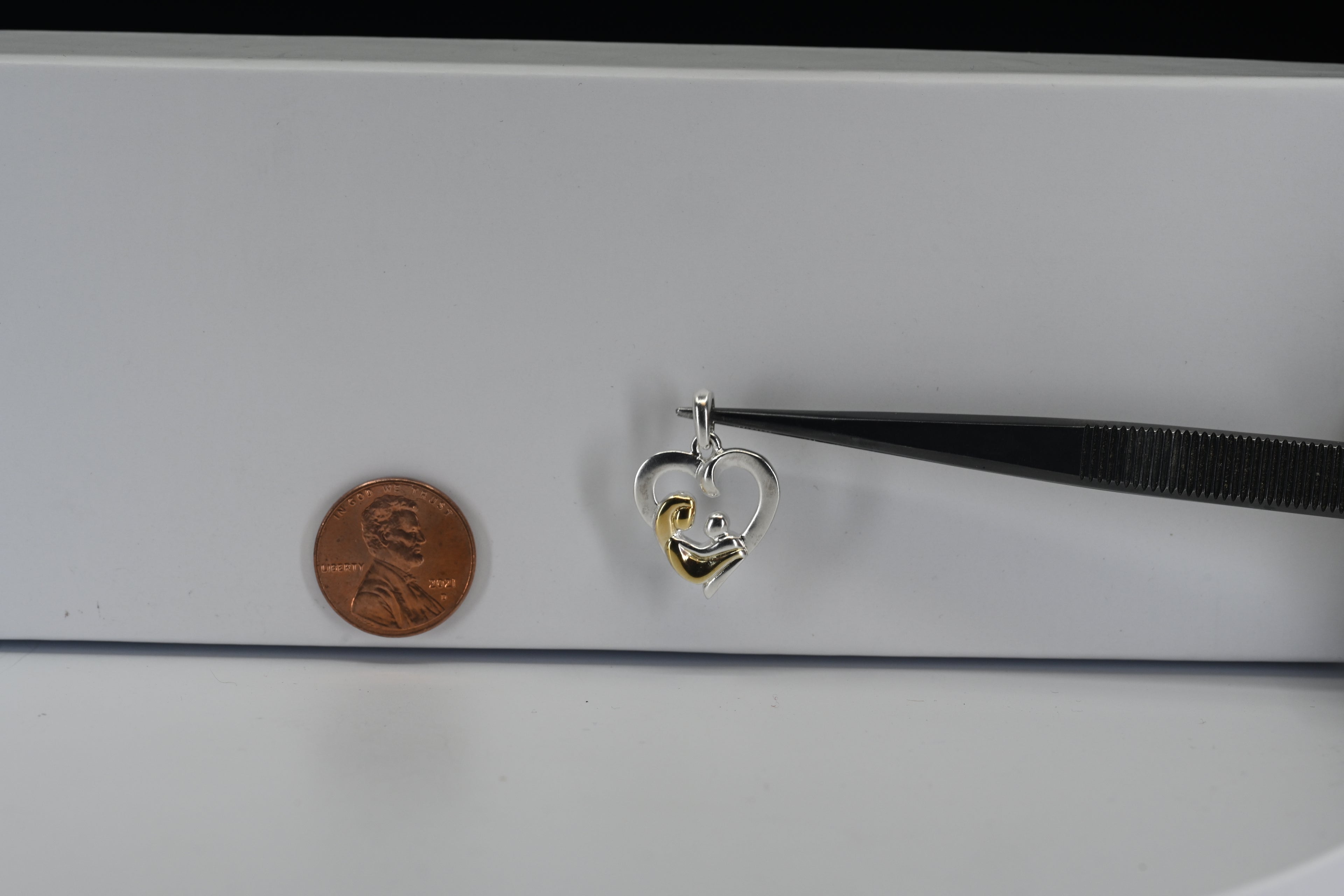 Sterling Silver Two-Tone Mother And Child Pendant