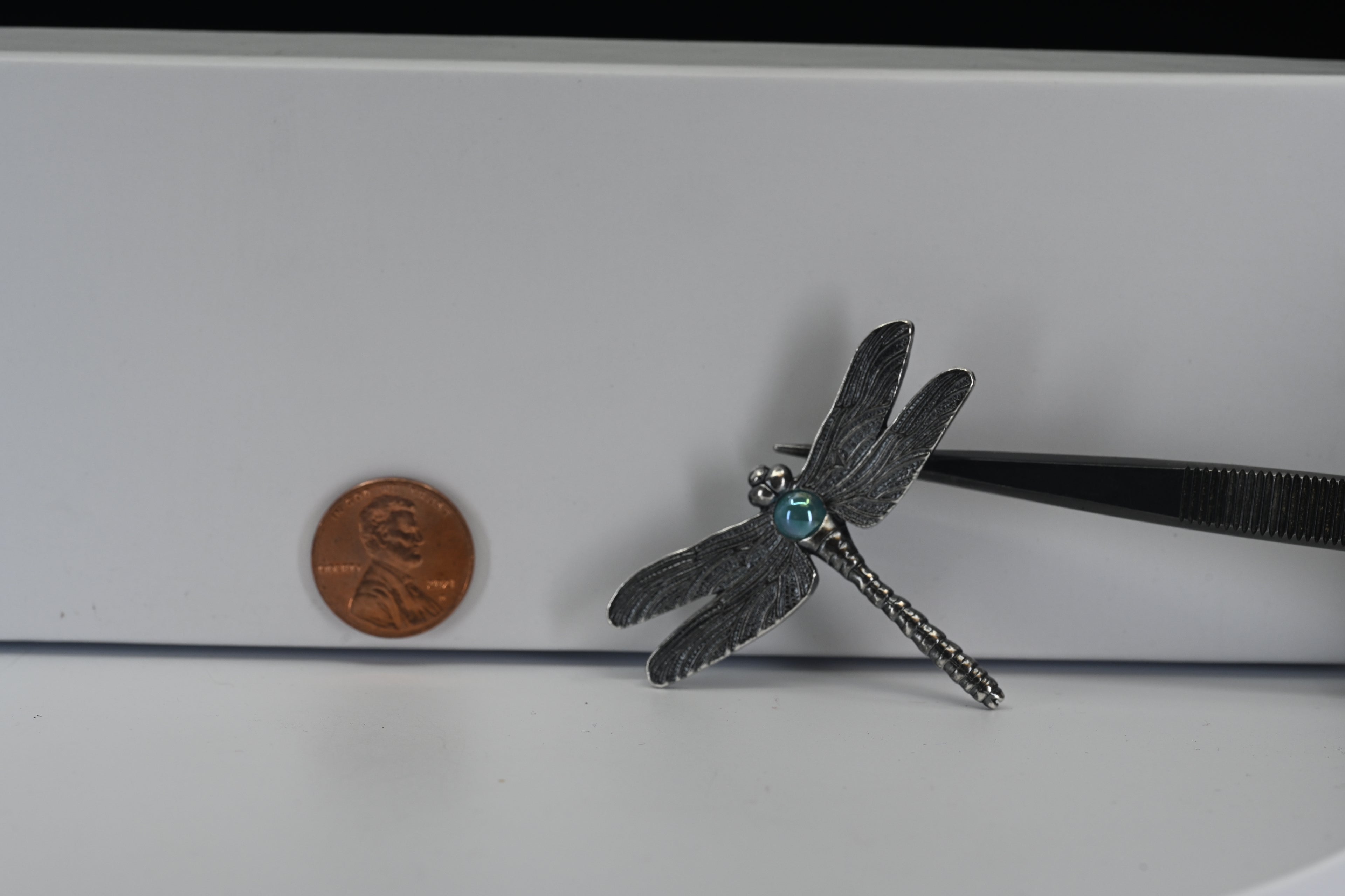 Sterling Silver Dragonfly With Round Light Blue Stone charm