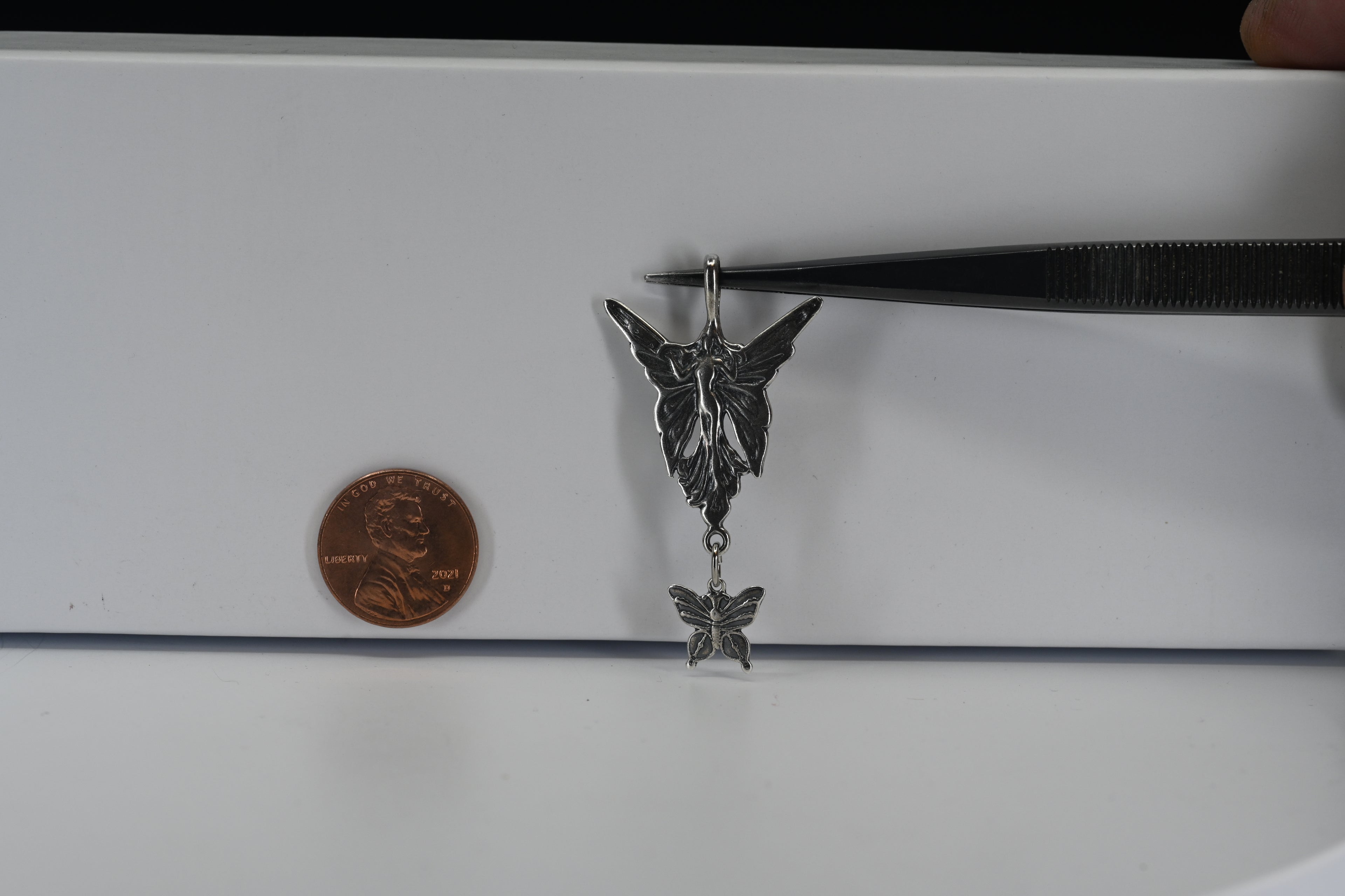 Sterling Silver Fairy With Dangling Butterfly Pendant