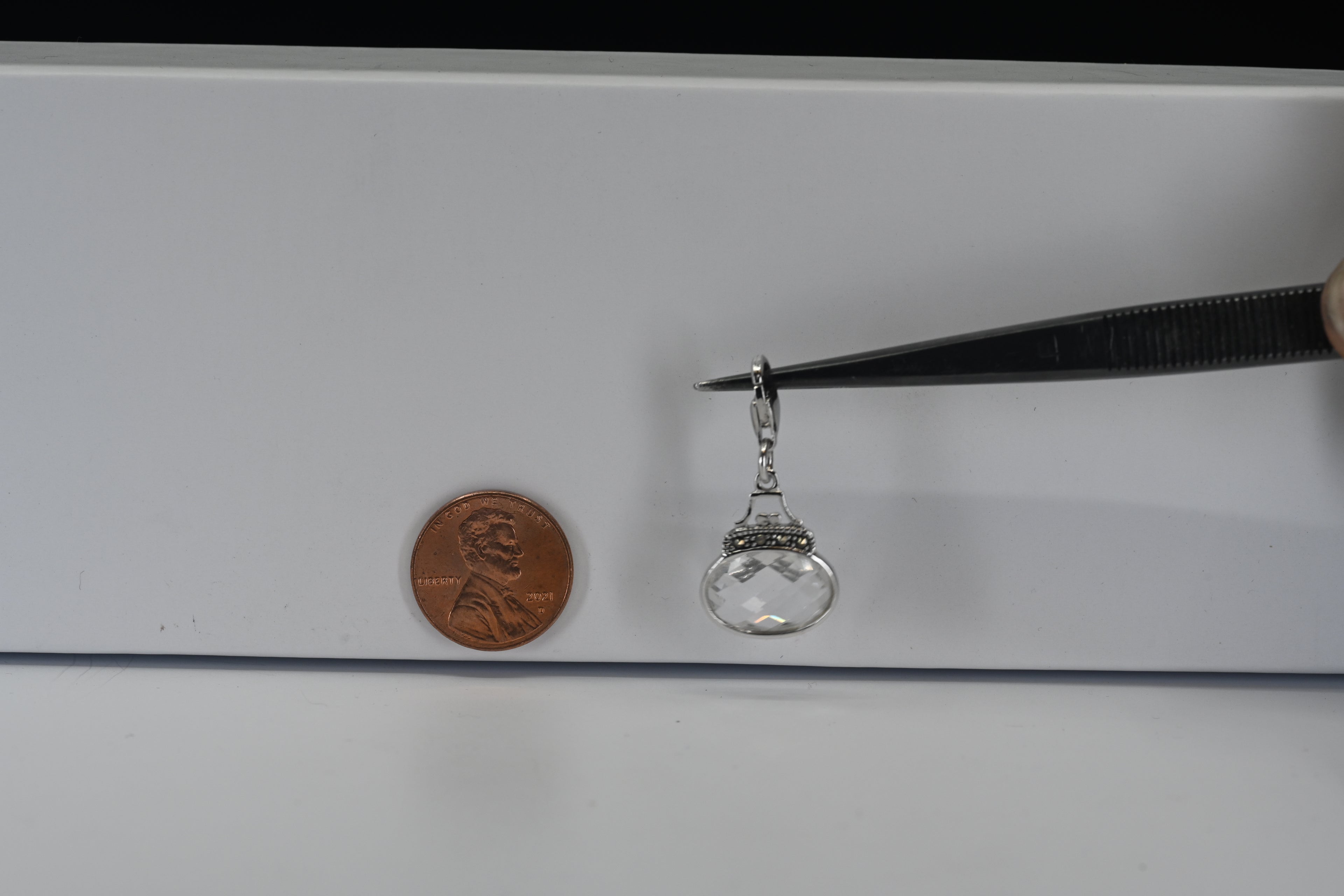 Sterling Silver Oval Checkered Colorless Stone Purse Charm