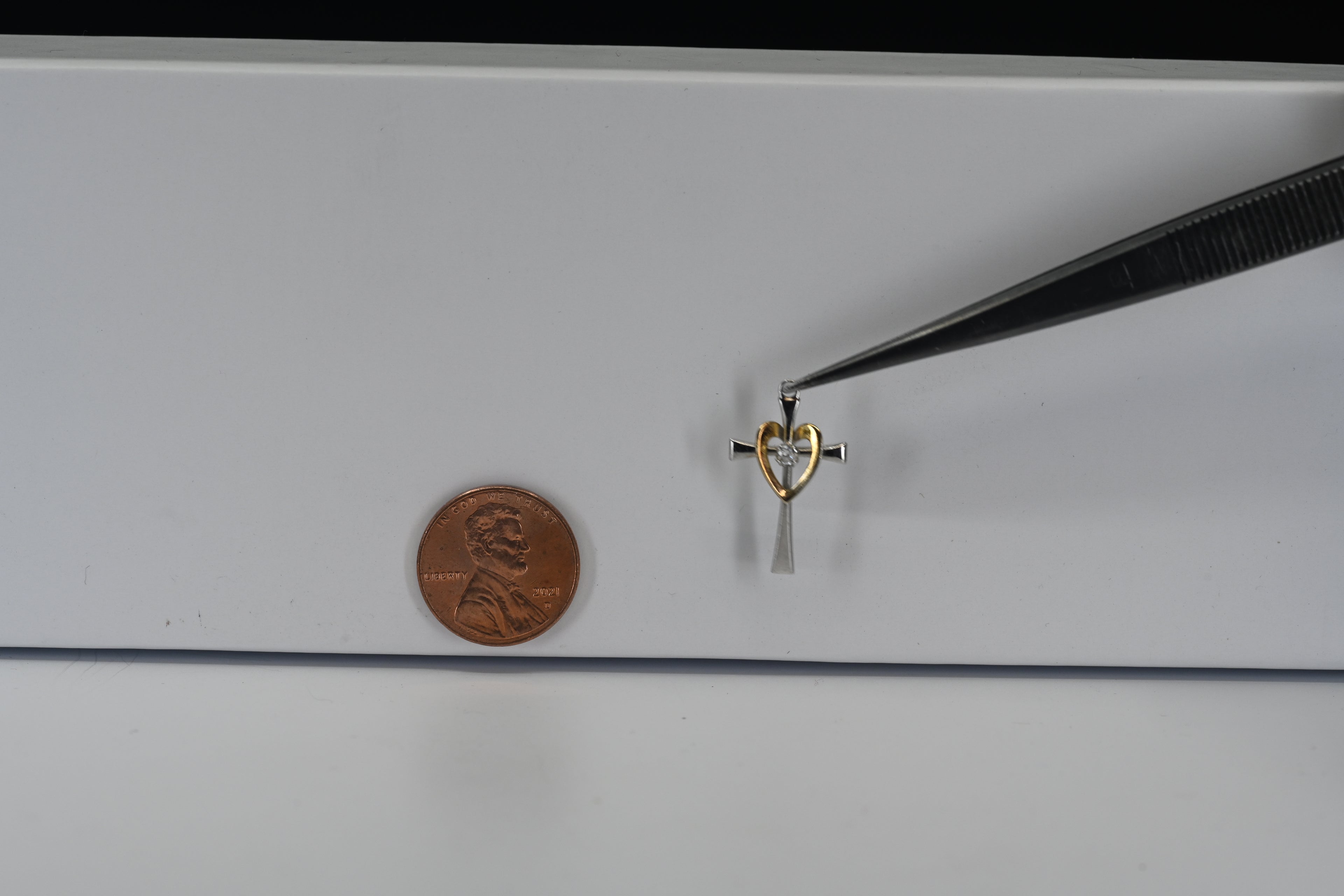 Sterling Silver Cross With Heart and Round Colorless Stone Charm