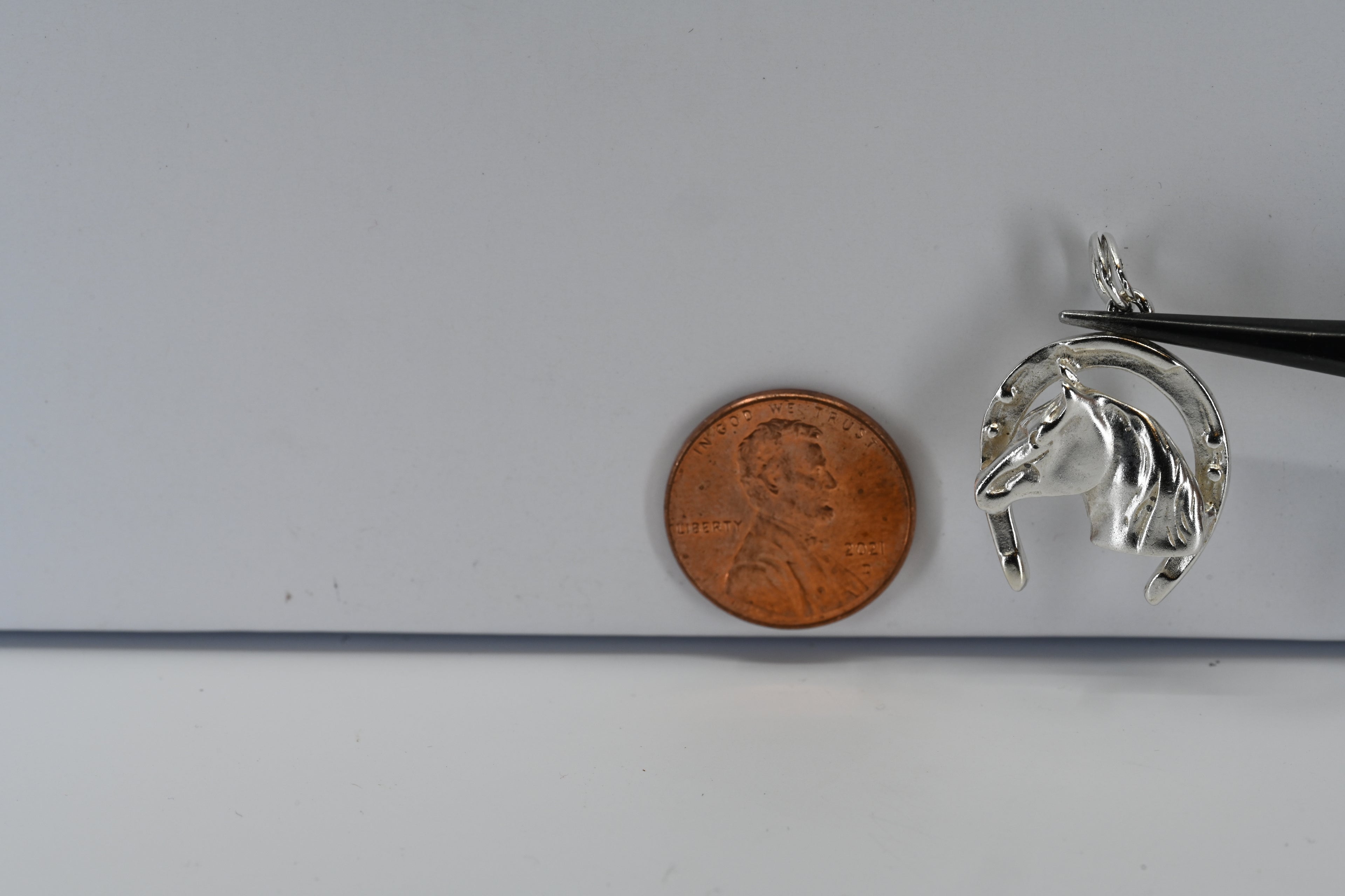 Sterling Silver Horse With Horseshoe Charm
