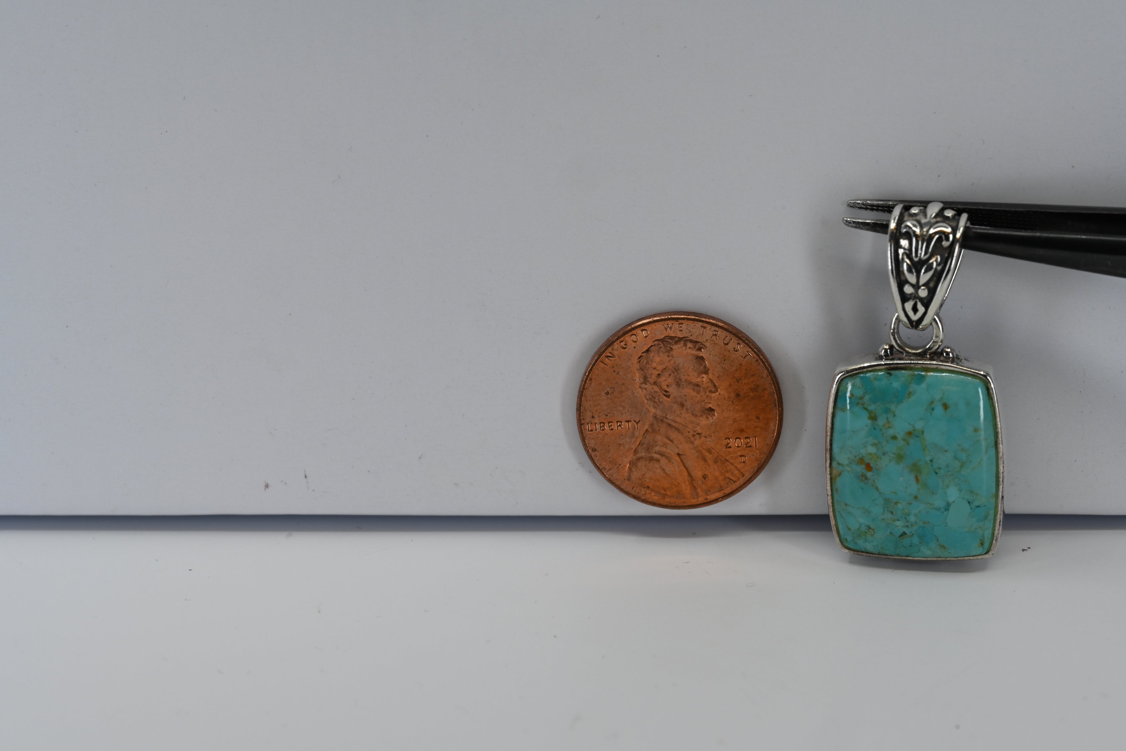 Sterling Silver Blue and Black Stone Pendant