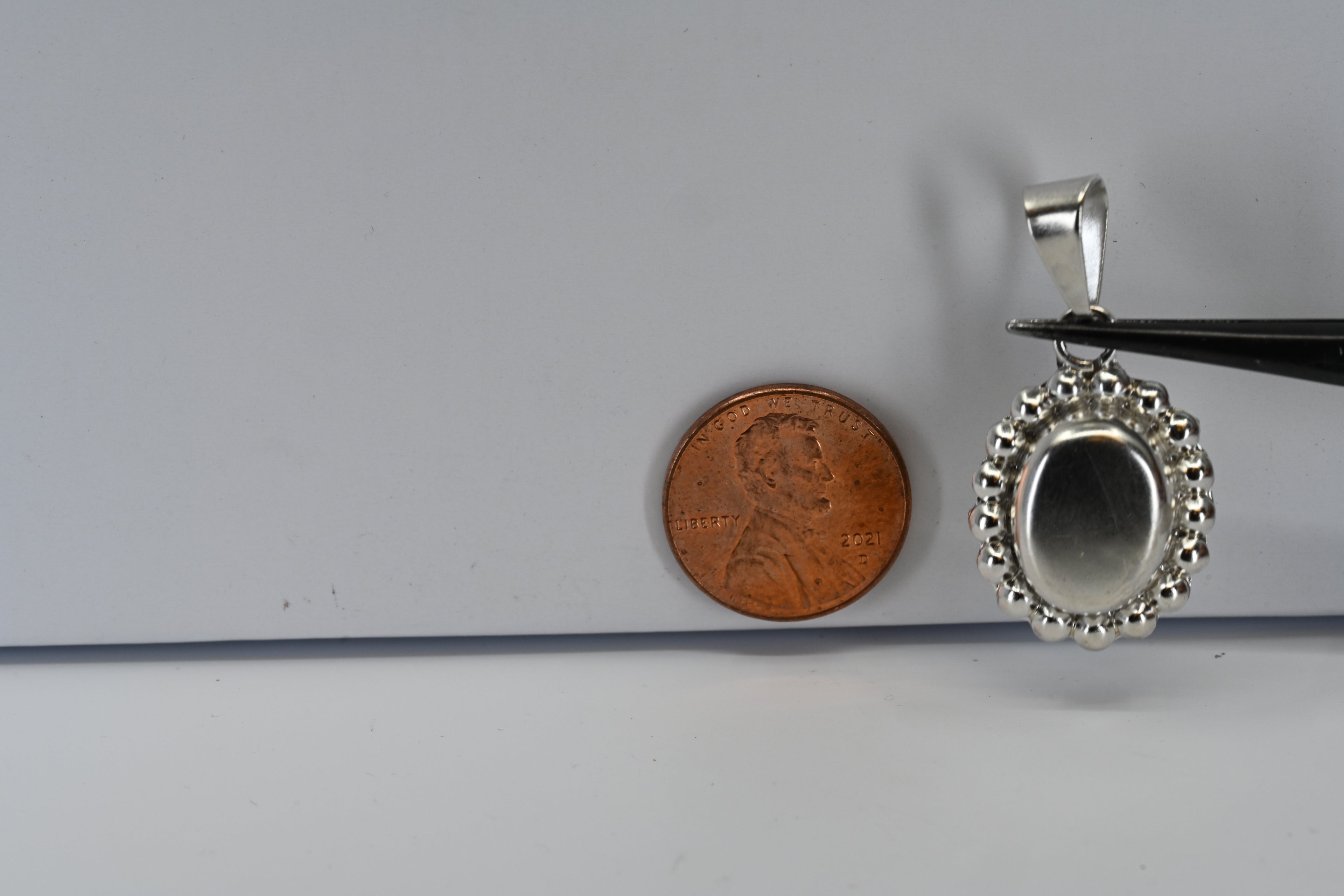Sterling Silver Beaded Oval Disc Pendant