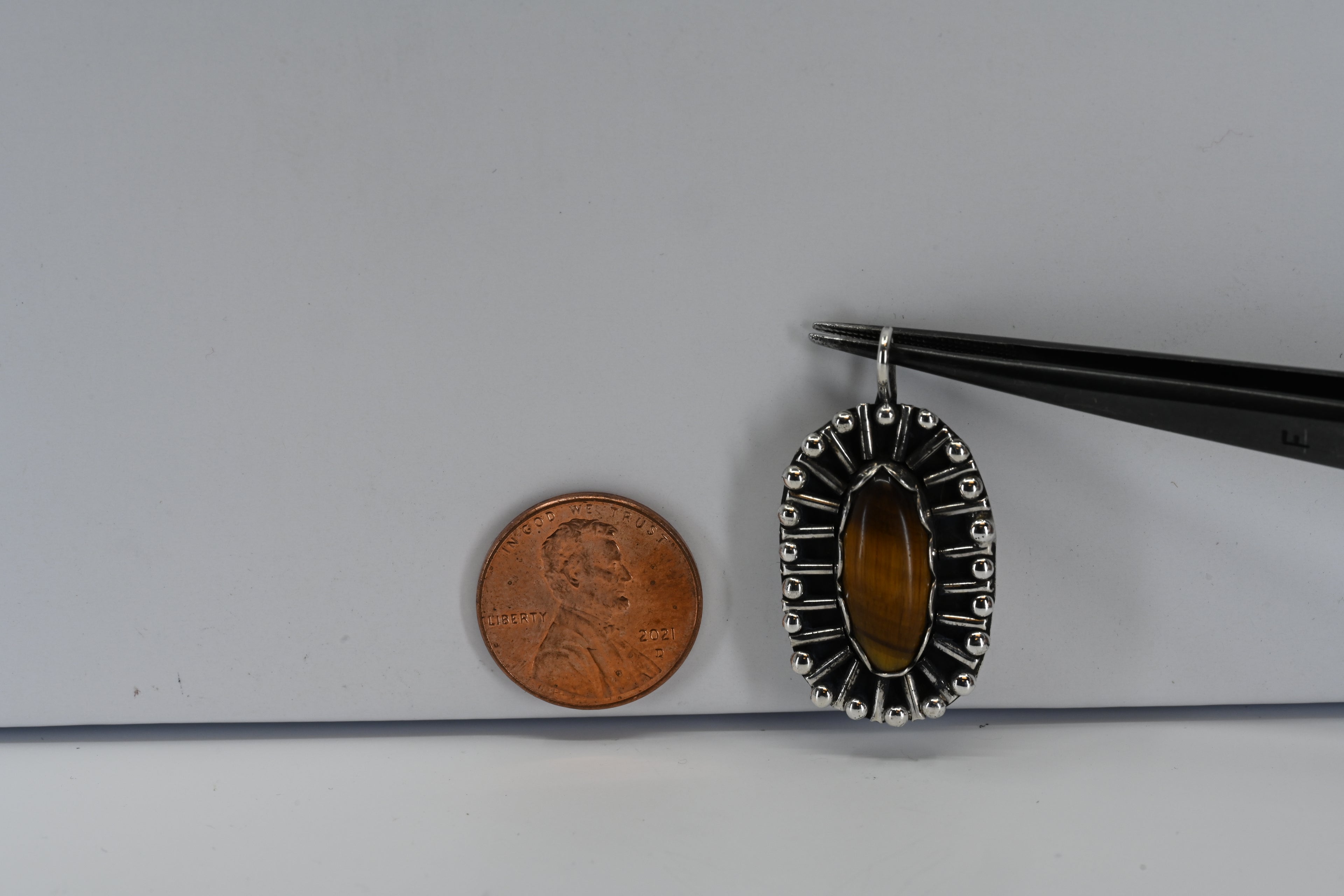 Sterling Silver Oval Tigers Eye Pendant