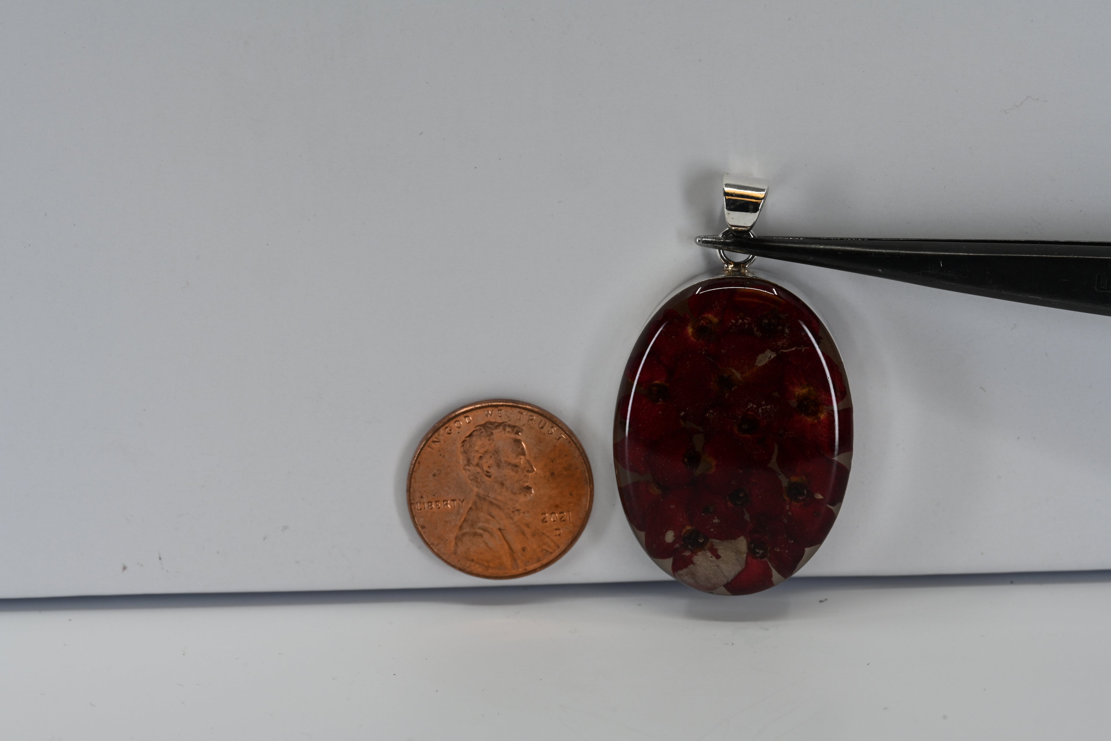 Sterling Silver Oval Pendant With Flowers