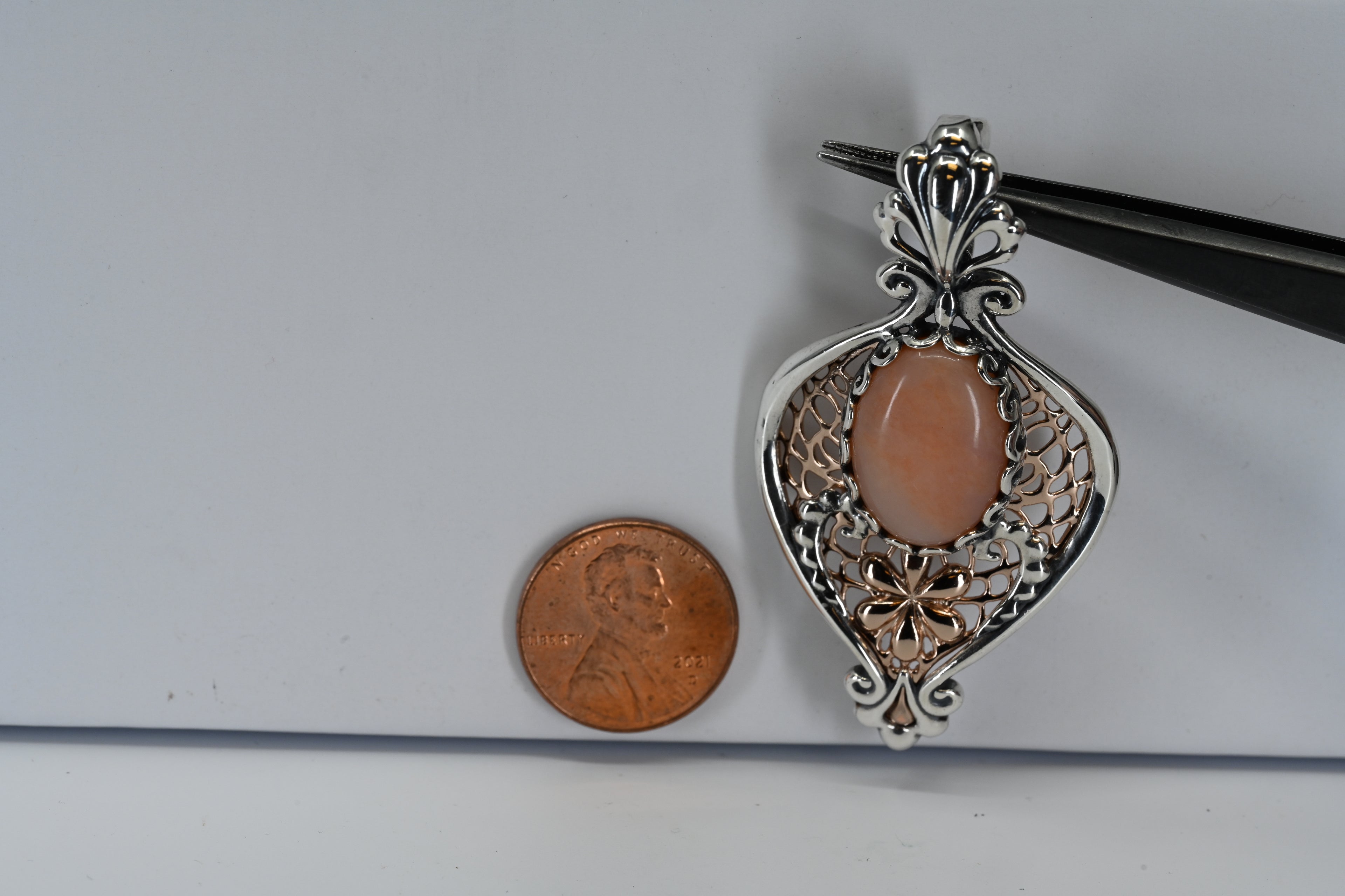 Sterling Silver Pink Oval Stone Pearl Enhancer