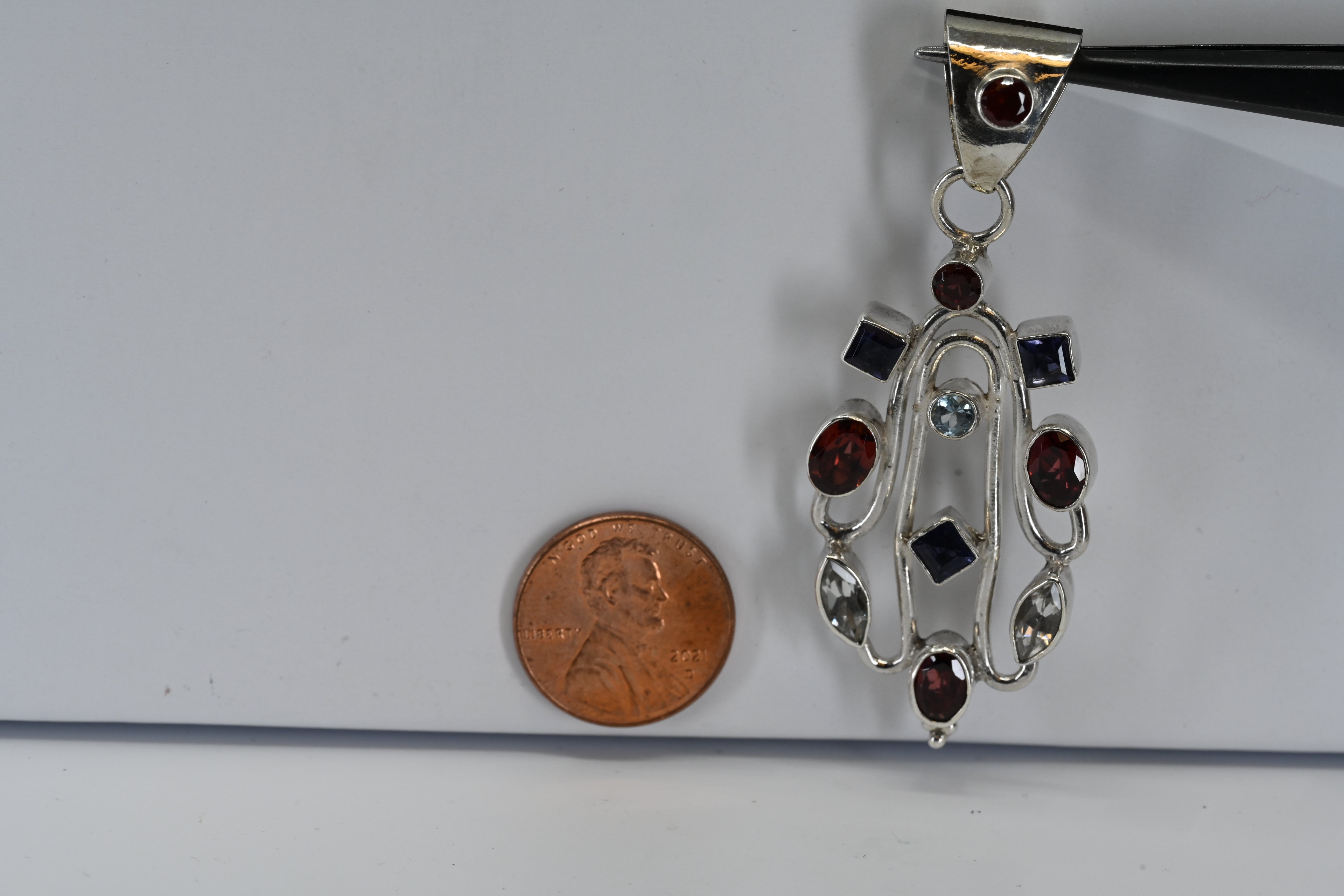 Sterling Silver Garnet Iolite Blue/While Topaz Pendant