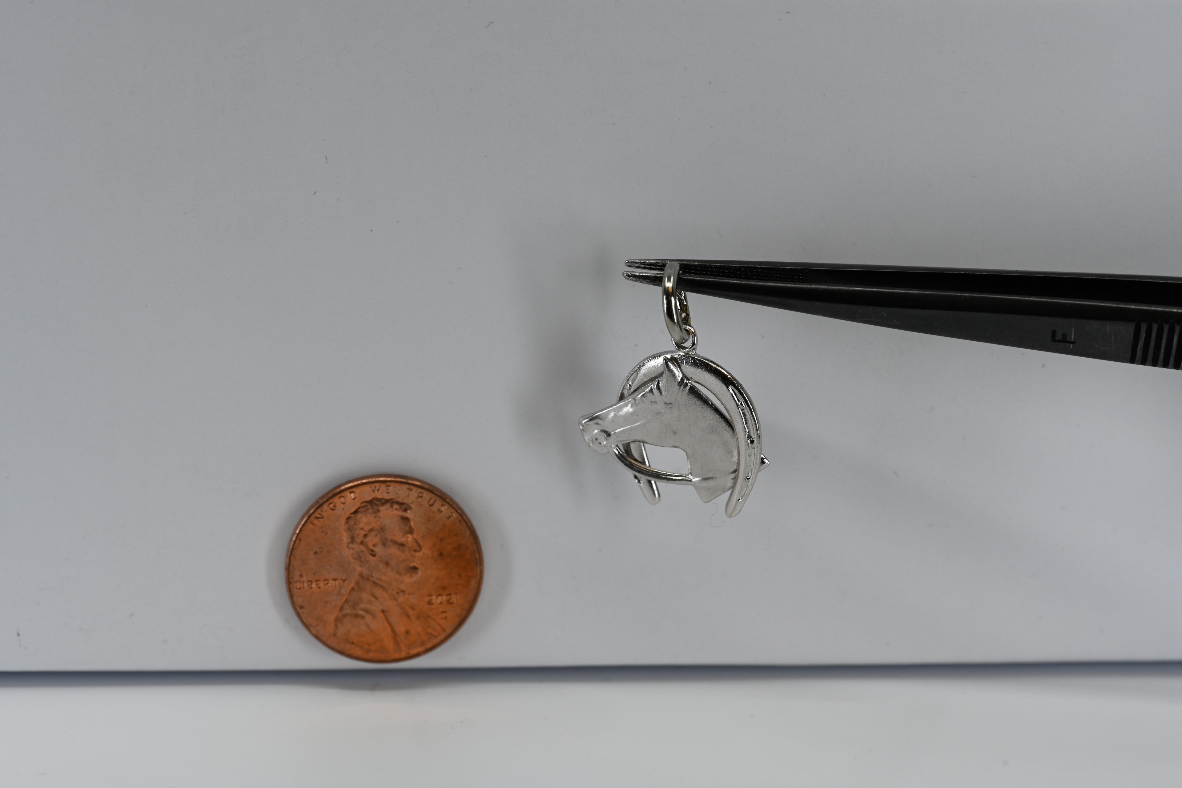 Sterling Silver Horse With Horseshoe Charm