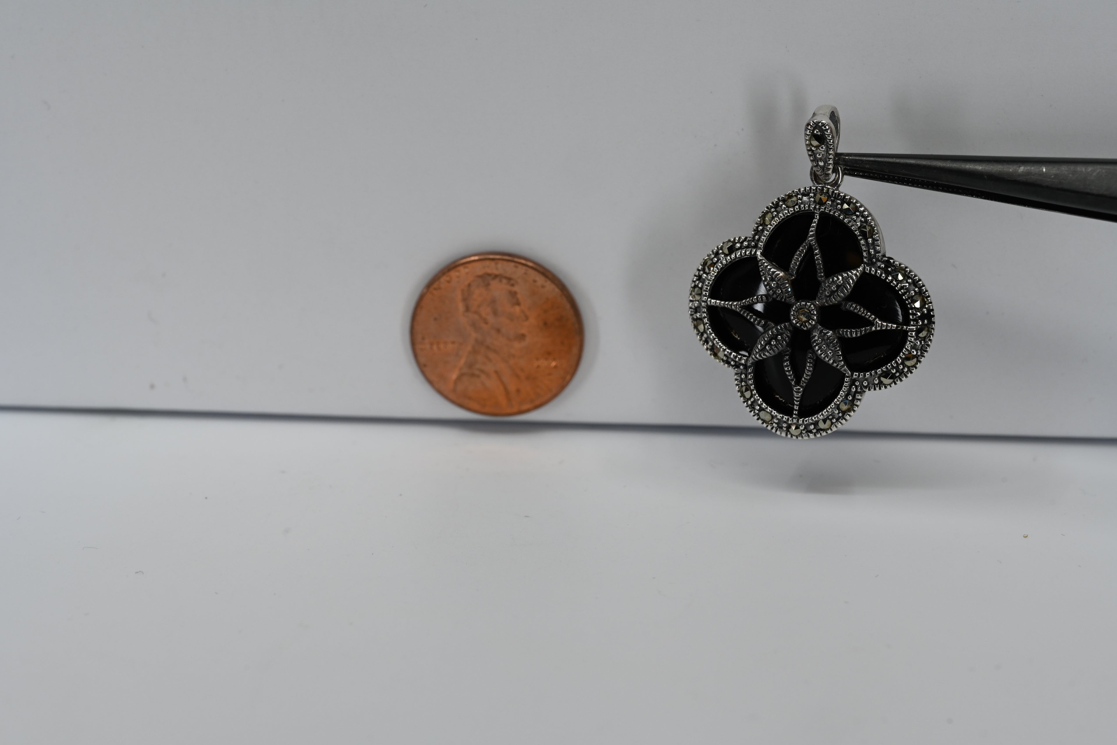 Sterling Silver Black Stone Floral Pattern Pendant