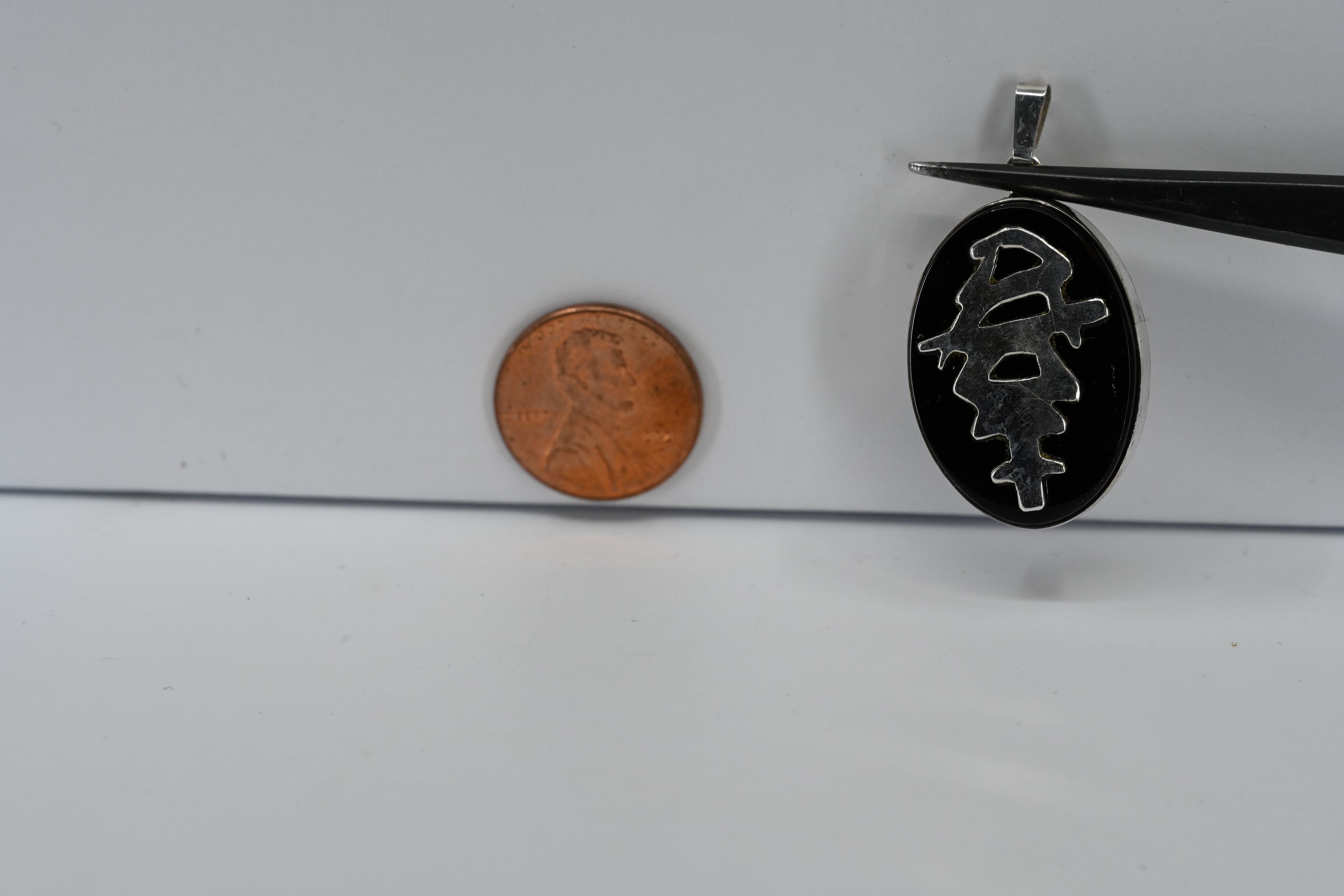 Sterling Silver Oval Black Stone Pendant