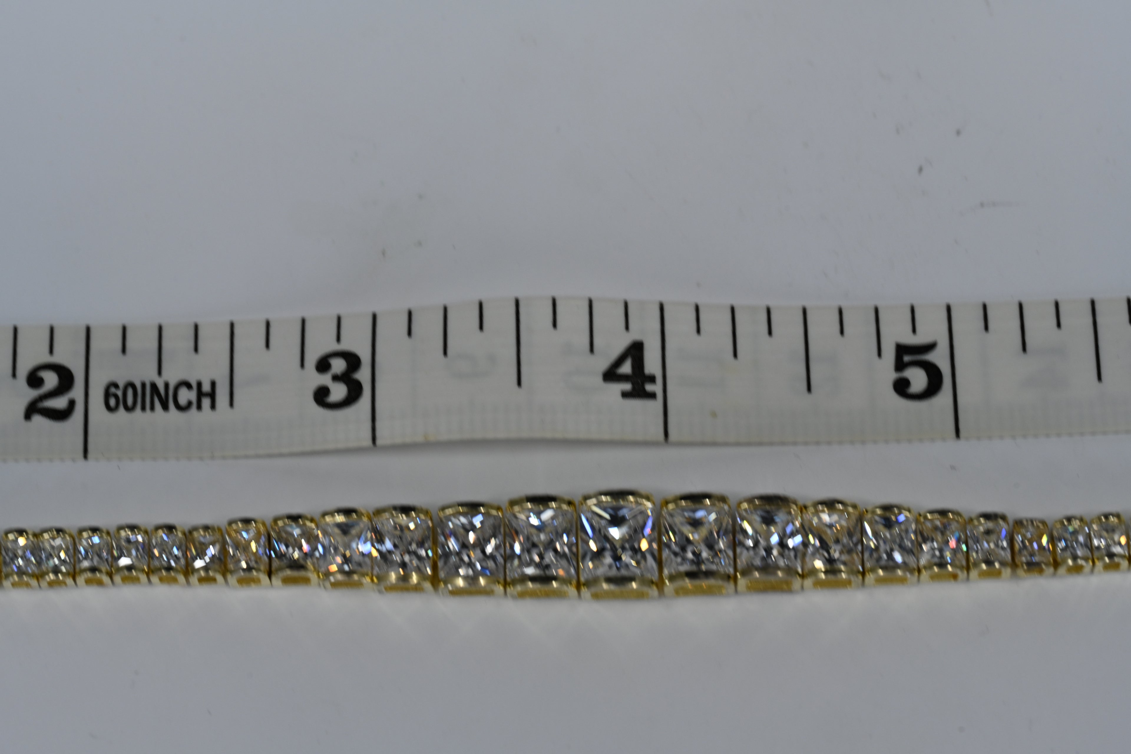 Sterling silver yellow colored Colorless Cubic Zirconia Graduated Bracelet