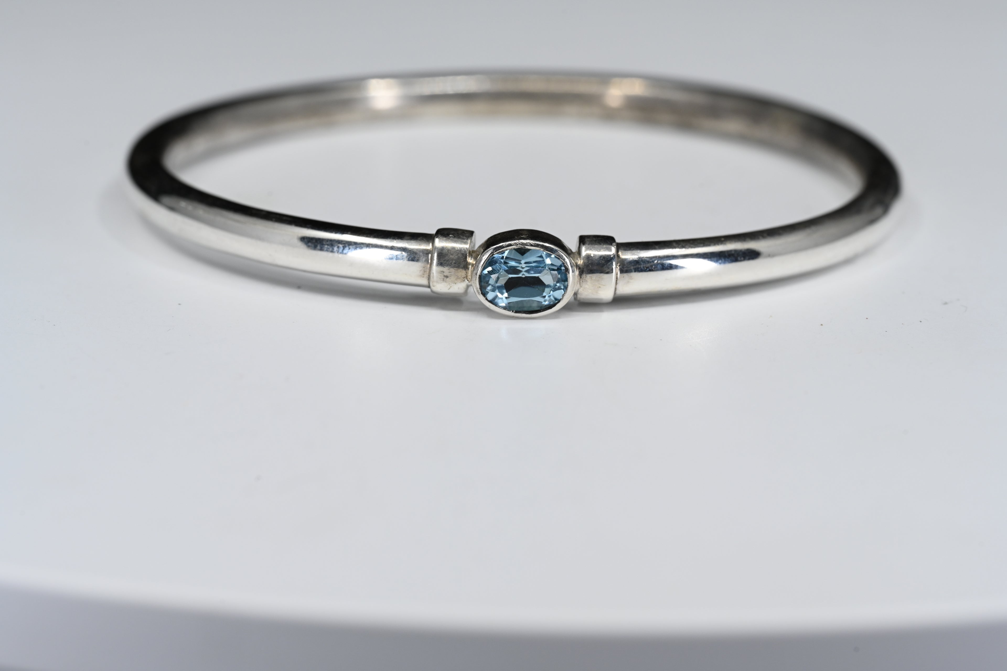 Sterling Silver Oval Light Blue Stone Bangle Bracelet