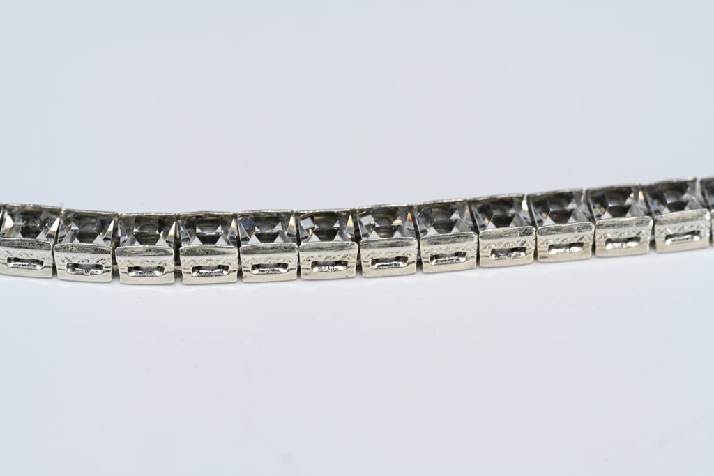 Sterling Silver Princess Cut  Colorless Stone Fold Over Clasp Tennis  Bracelet