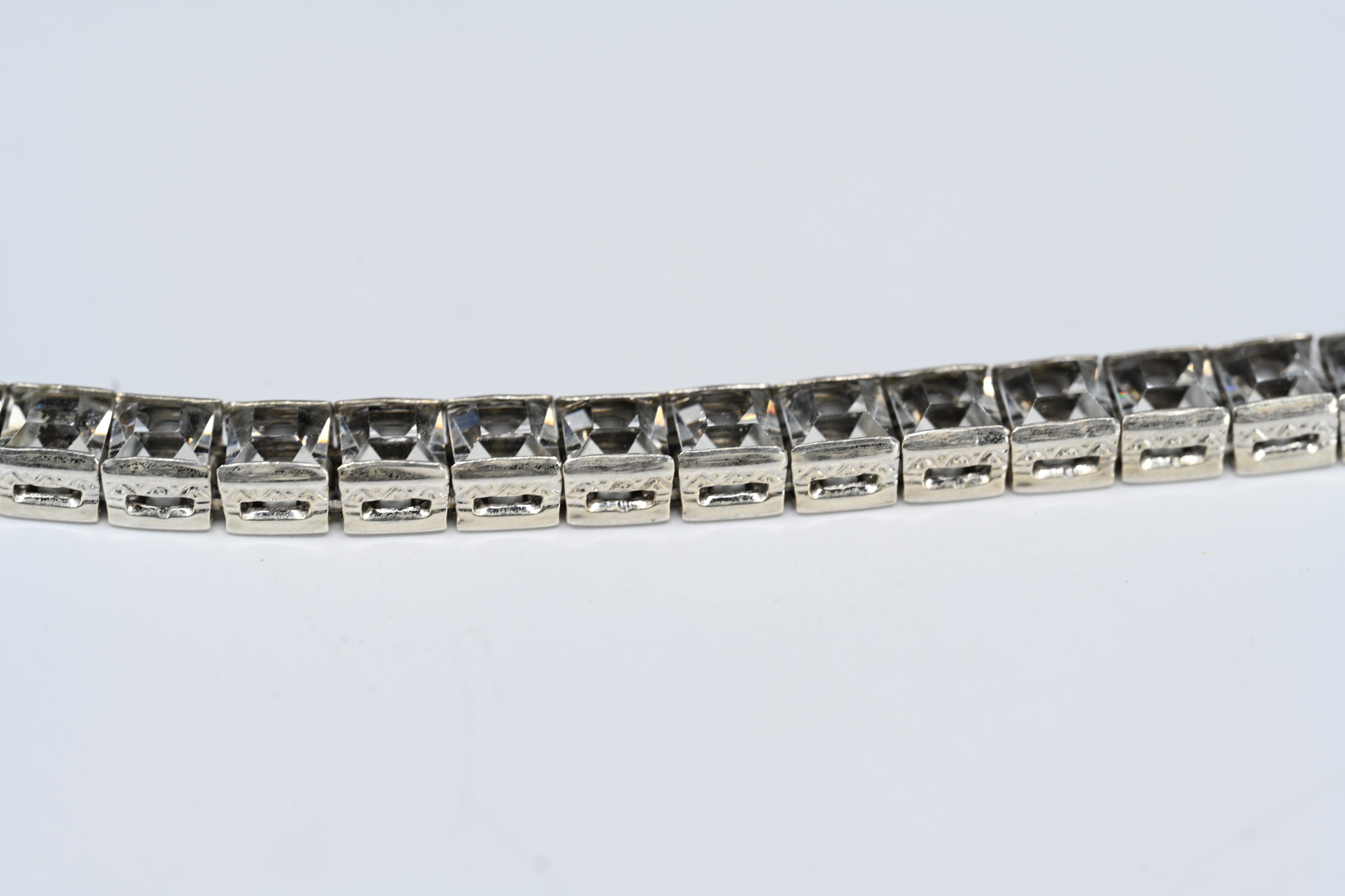 Sterling Silver Princess Cut  Colorless Stone Fold Over Clasp Tennis  Bracelet