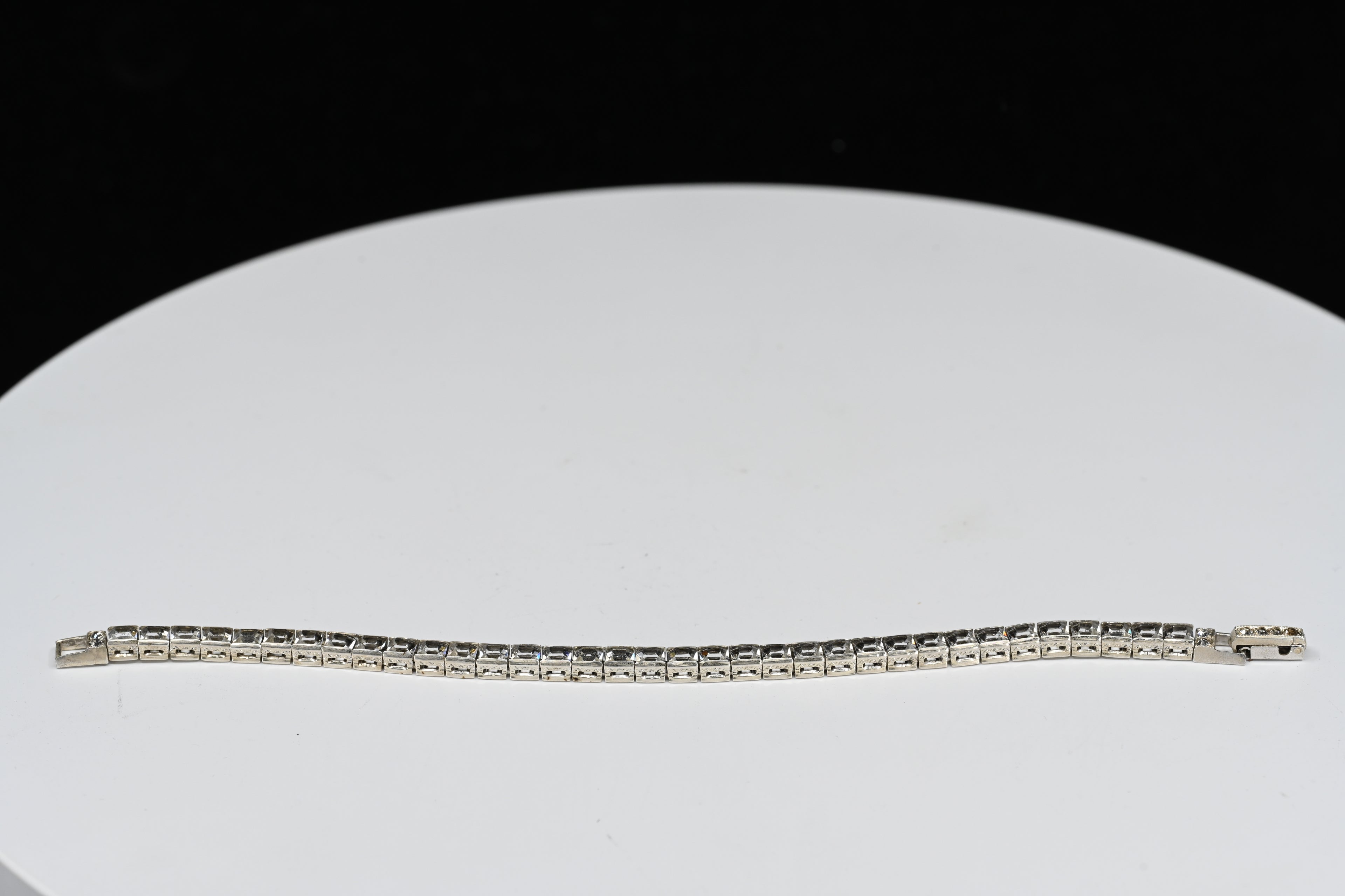 Sterling Silver Princess Cut  Colorless Stone Fold Over Clasp Tennis  Bracelet