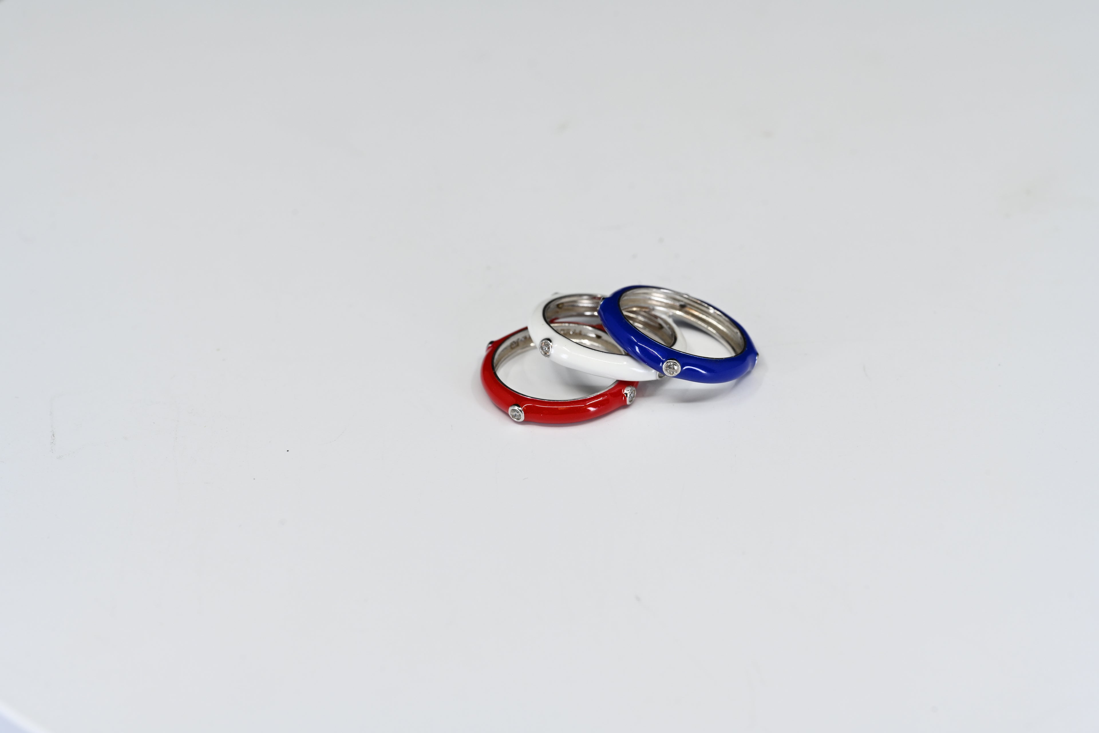 Sterling Silver Red White And Blue Stacked Ring Set With Round Colorless Stones