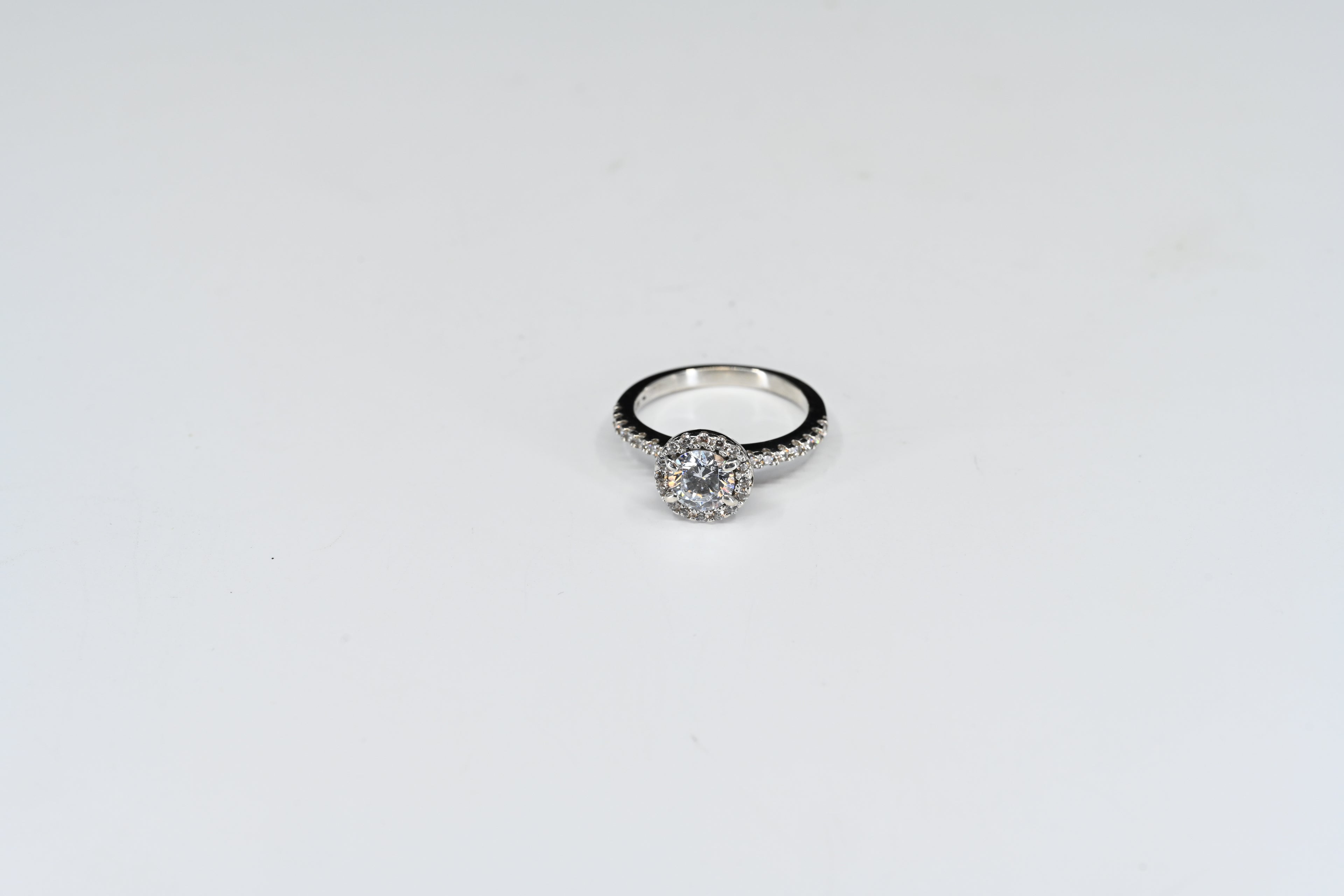Sterling Silver Round Colorless Stones With Halo And Down The Sides Ring