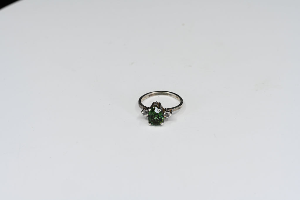 Sterling Silver Green Pear Shape With Round Colorless Stones Three Stone Ring