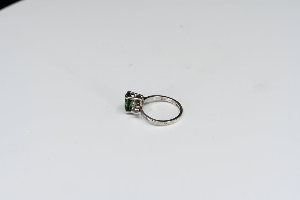 Sterling Silver Green Pear Shape With Round Colorless Stones Three Stone Ring