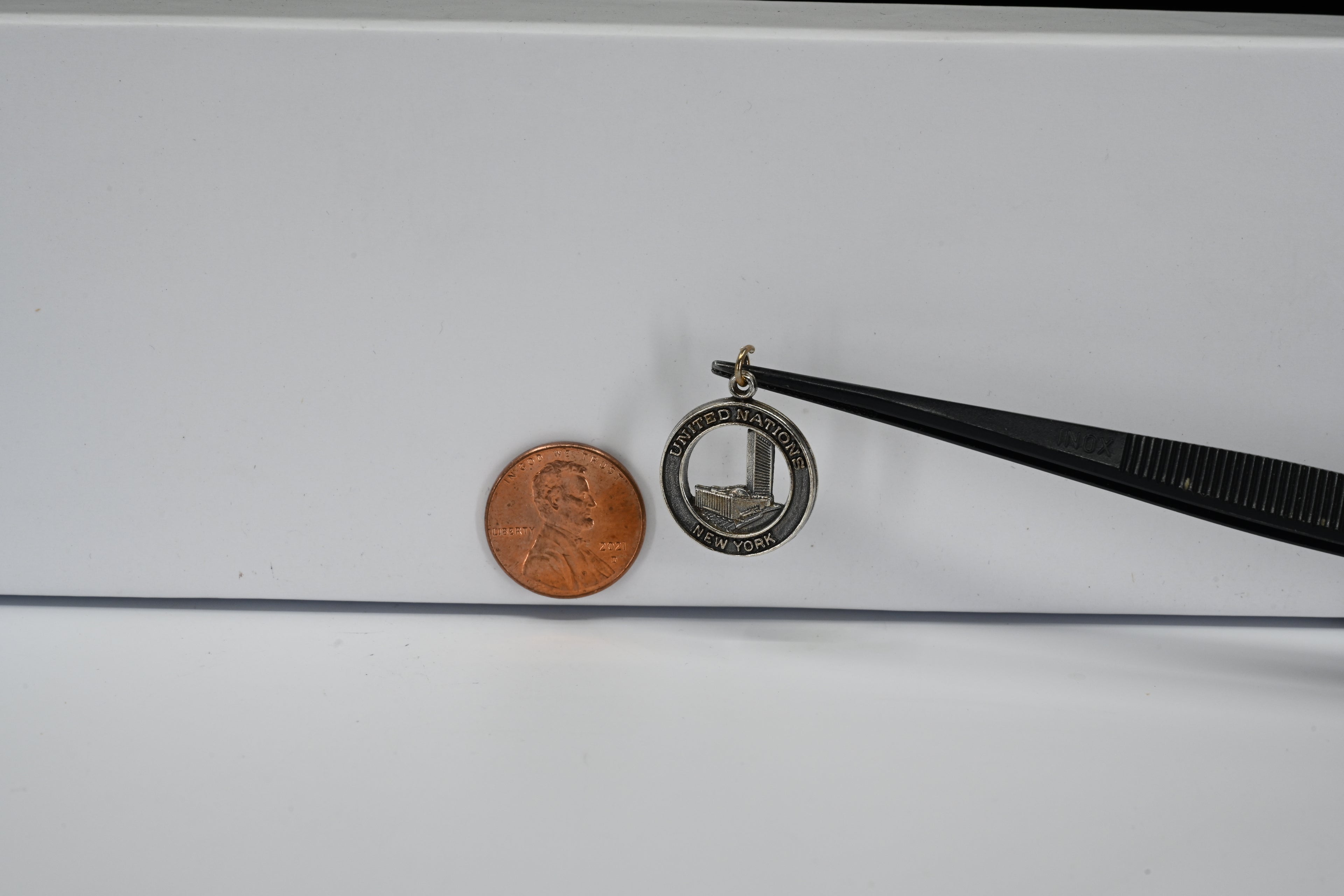 Sterling Silver Round United Nations New York Charm