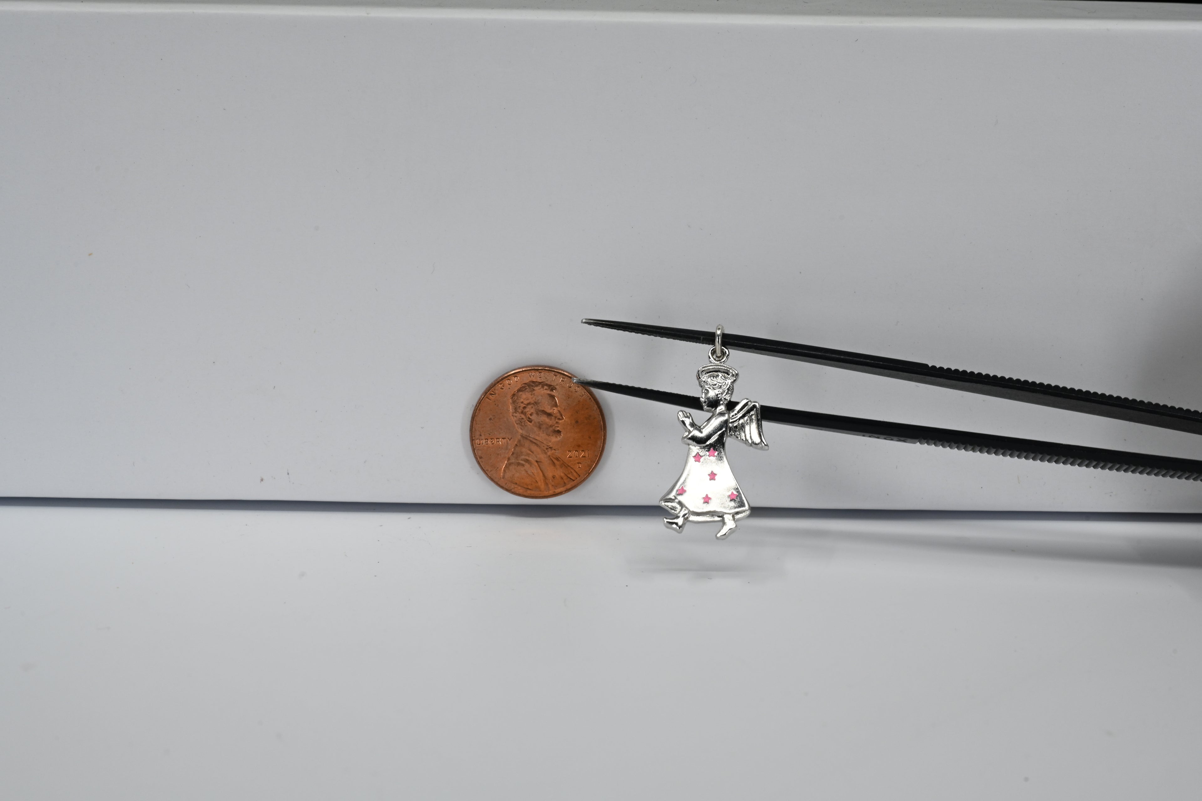 Sterling Silver Angel With Pink Stars Charm