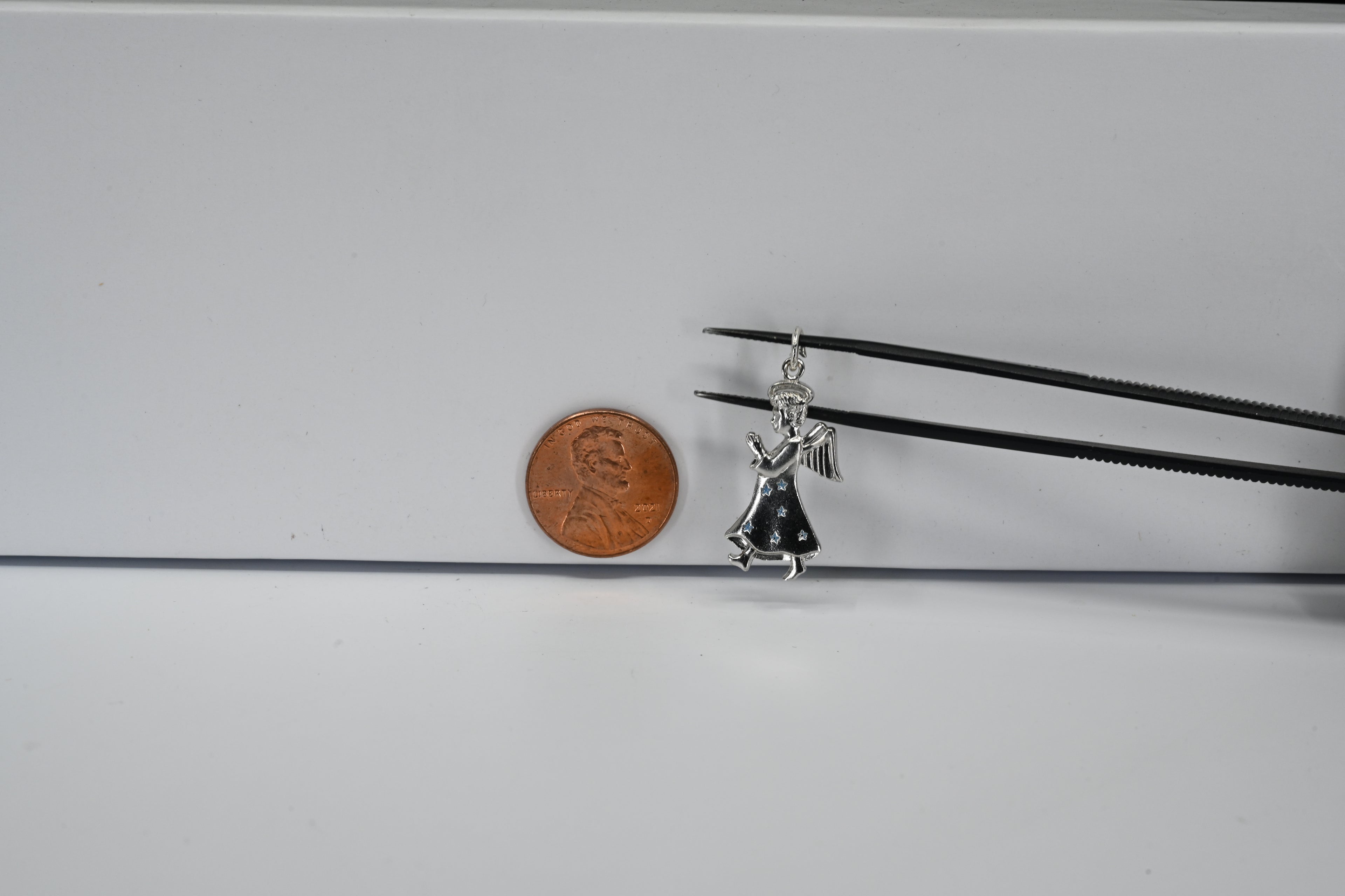 Sterling Silver Angle With Blue Stars Charm
