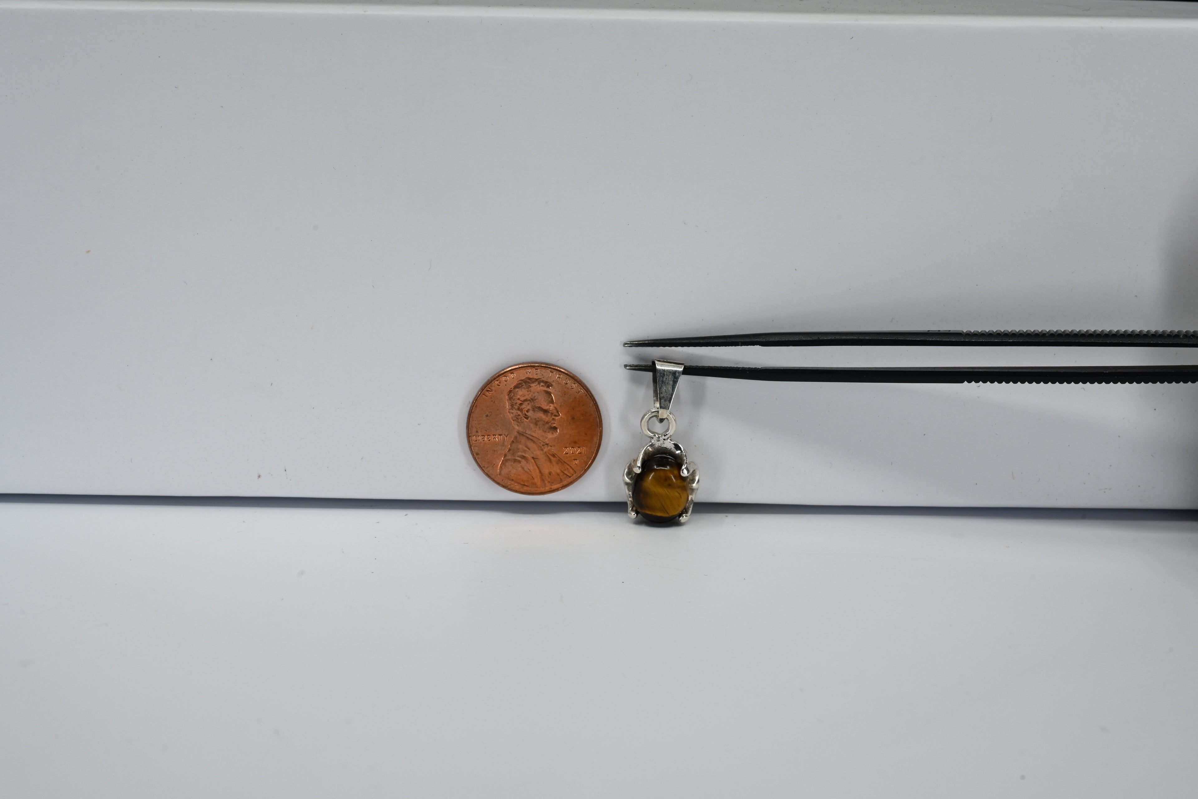 Sterling Silver Round Synthetic Tigers Eye Pendant