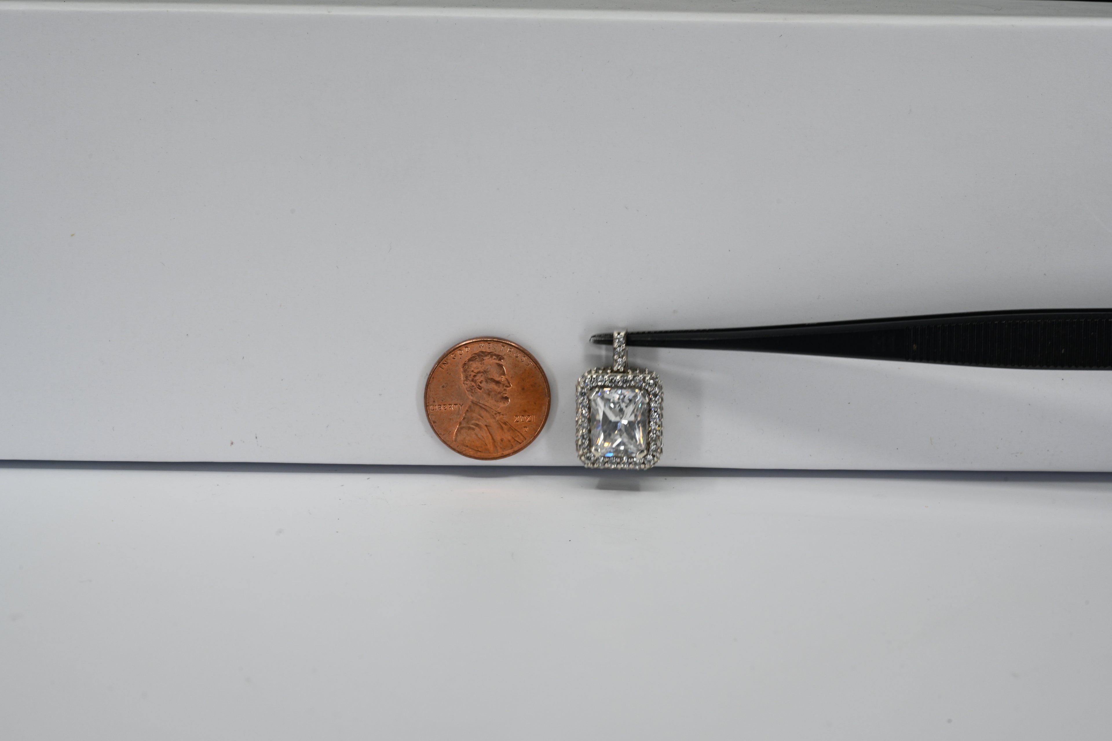Sterling Silver Rectangle Colorless Center With Round Colorless Halo Stone Pendant