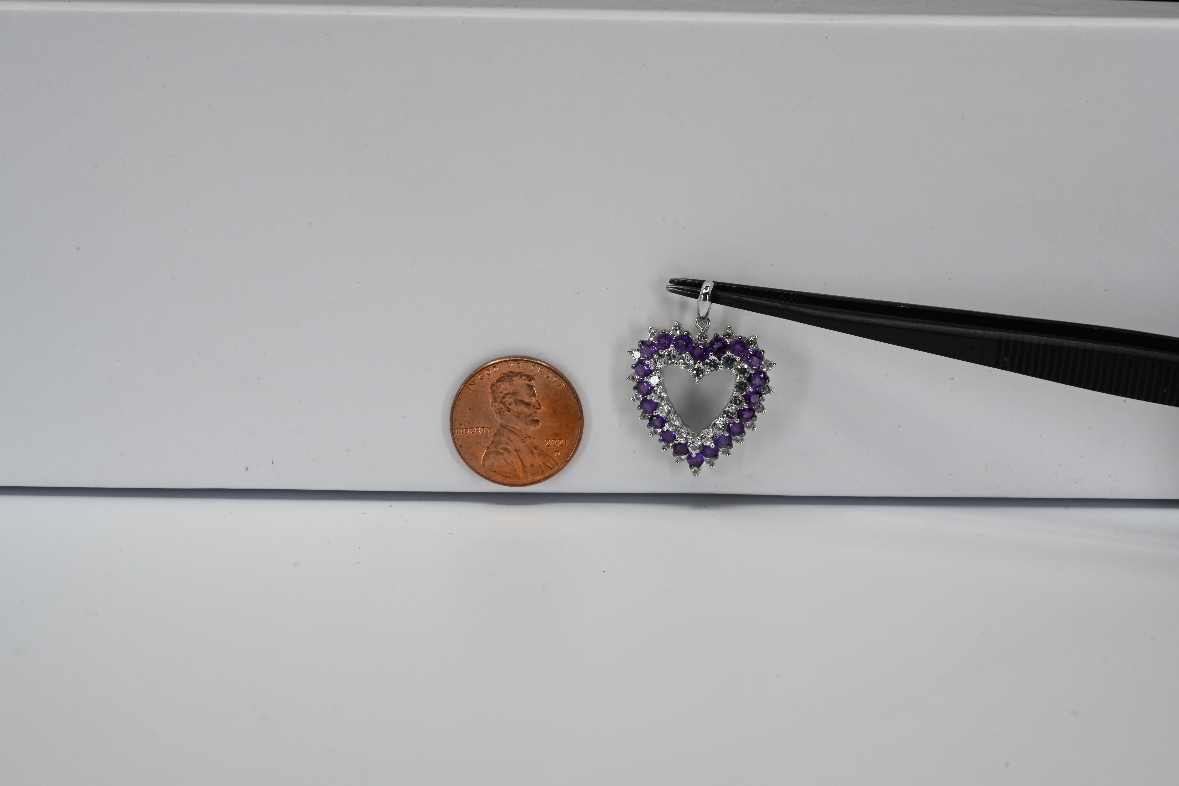 Sterling Silver Round Purple and Colorless  Stones Heart Shaped Pendant