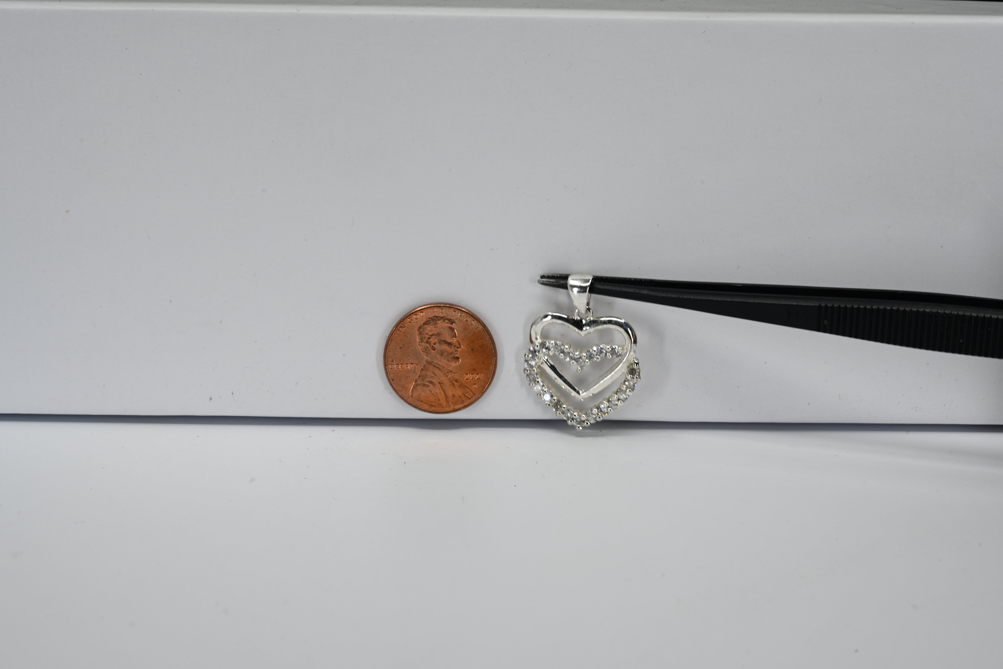 Sterling Silver Double Heart With Colorless Round Stones Pendant
