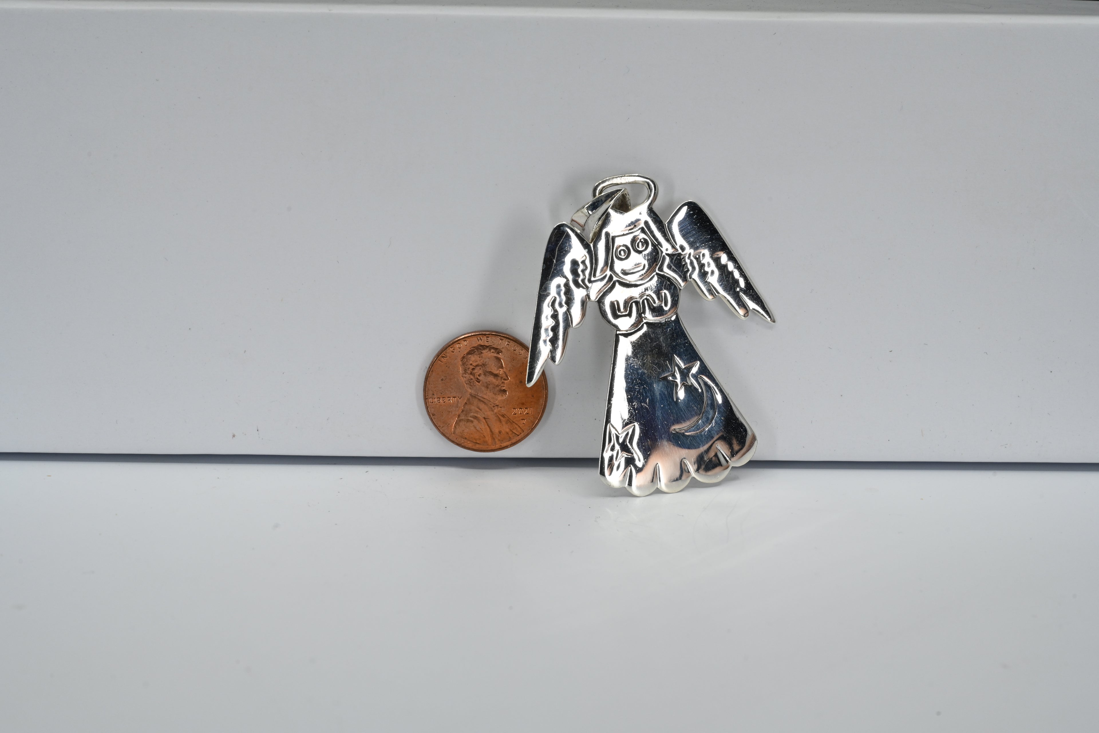 Sterling Silver Puffy Angel With Stars And Moon Pendant