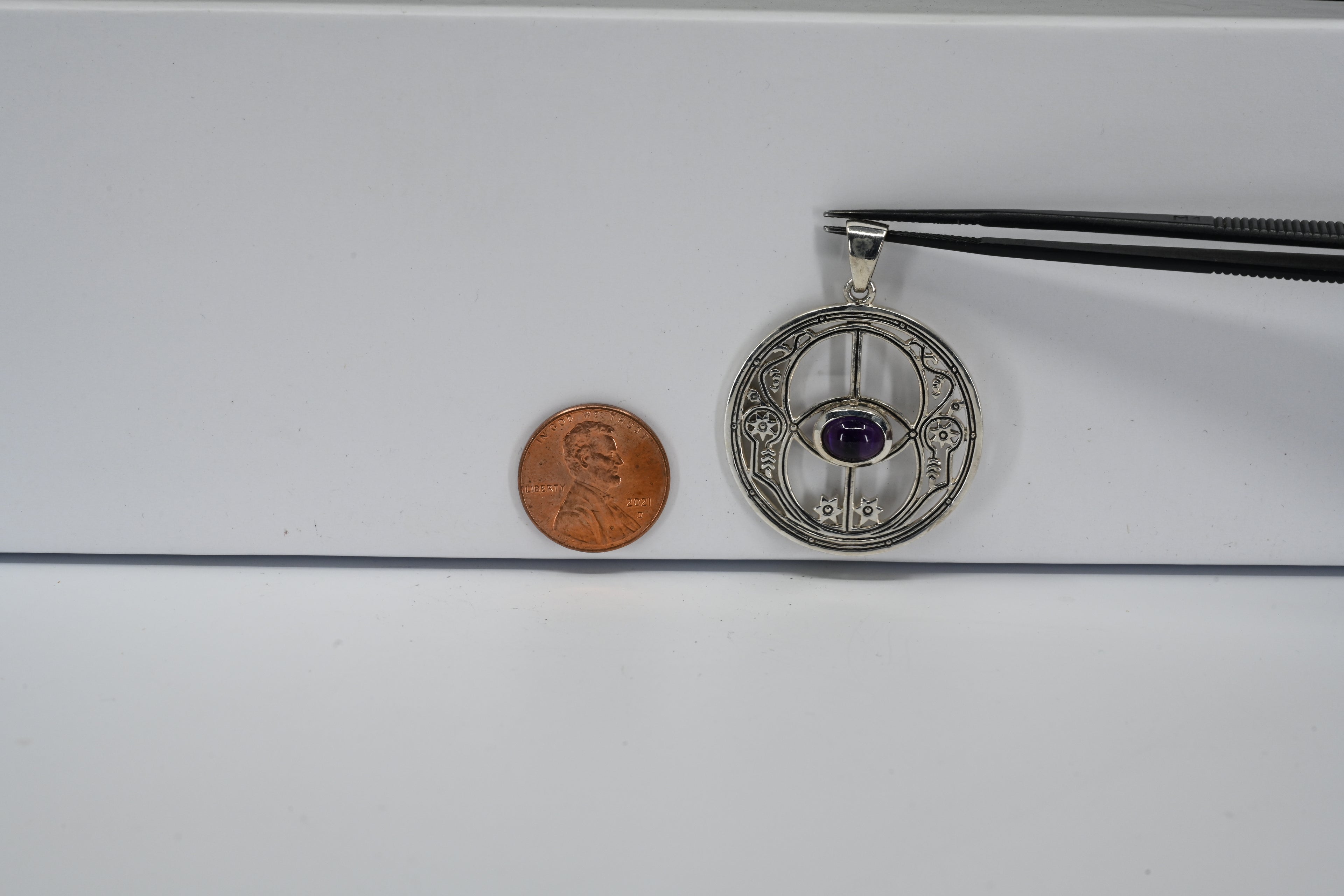 Sterling Silver Chalice Well With Purple Stone pendant