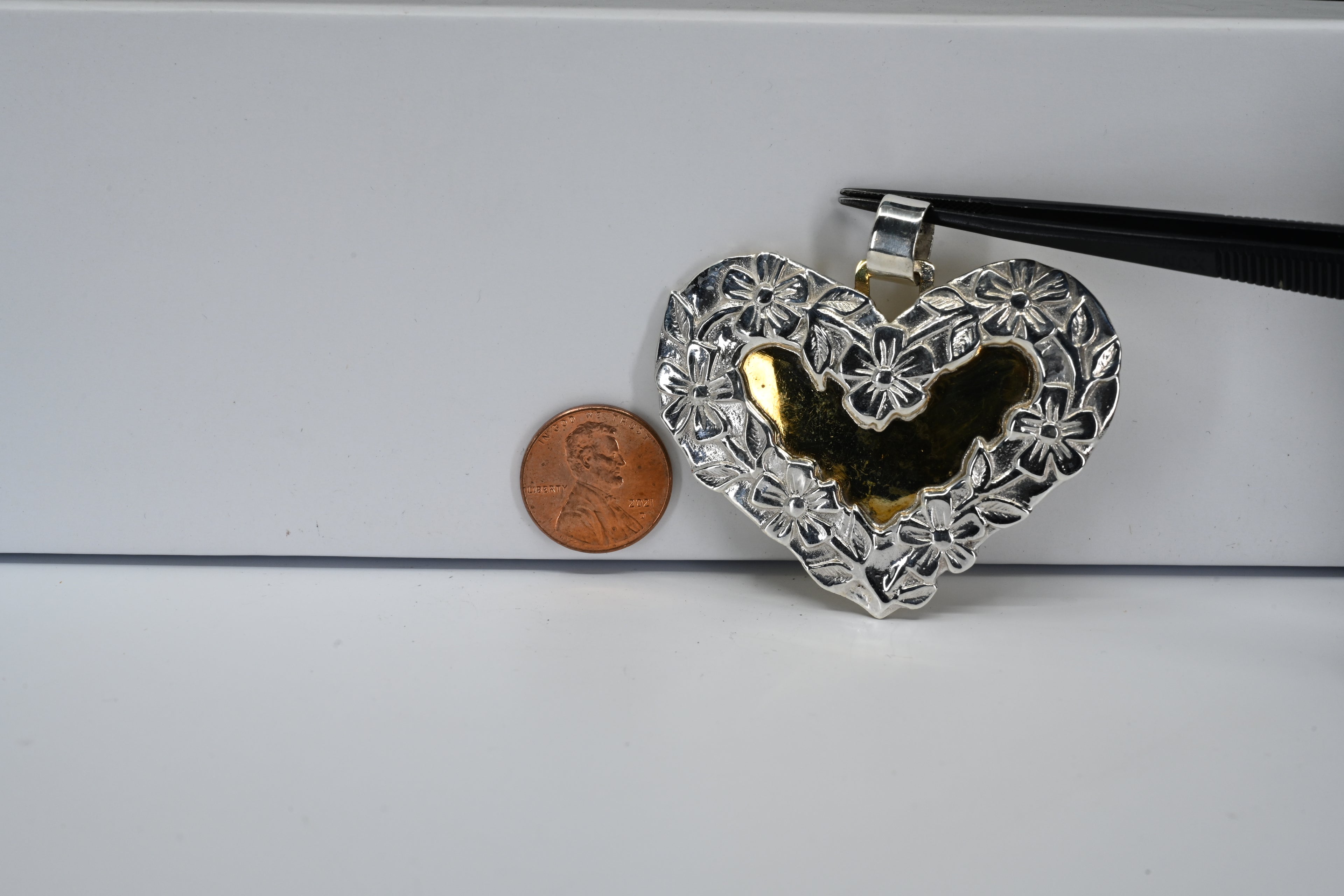 Sterling Silver Floral Heart With Yellow-Tone Center Pendant