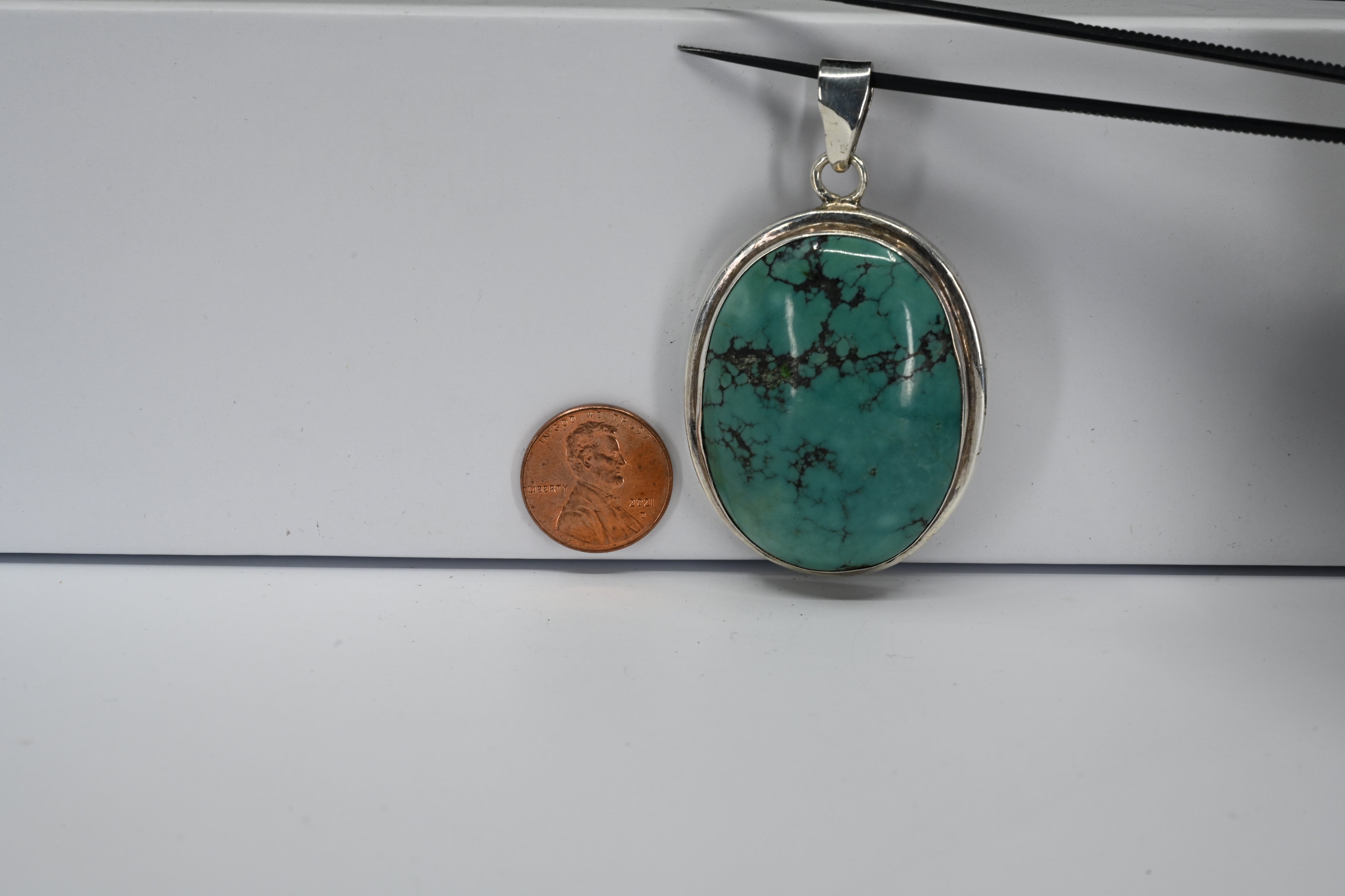 Sterling Silver Oval Teal Stone Pendant
